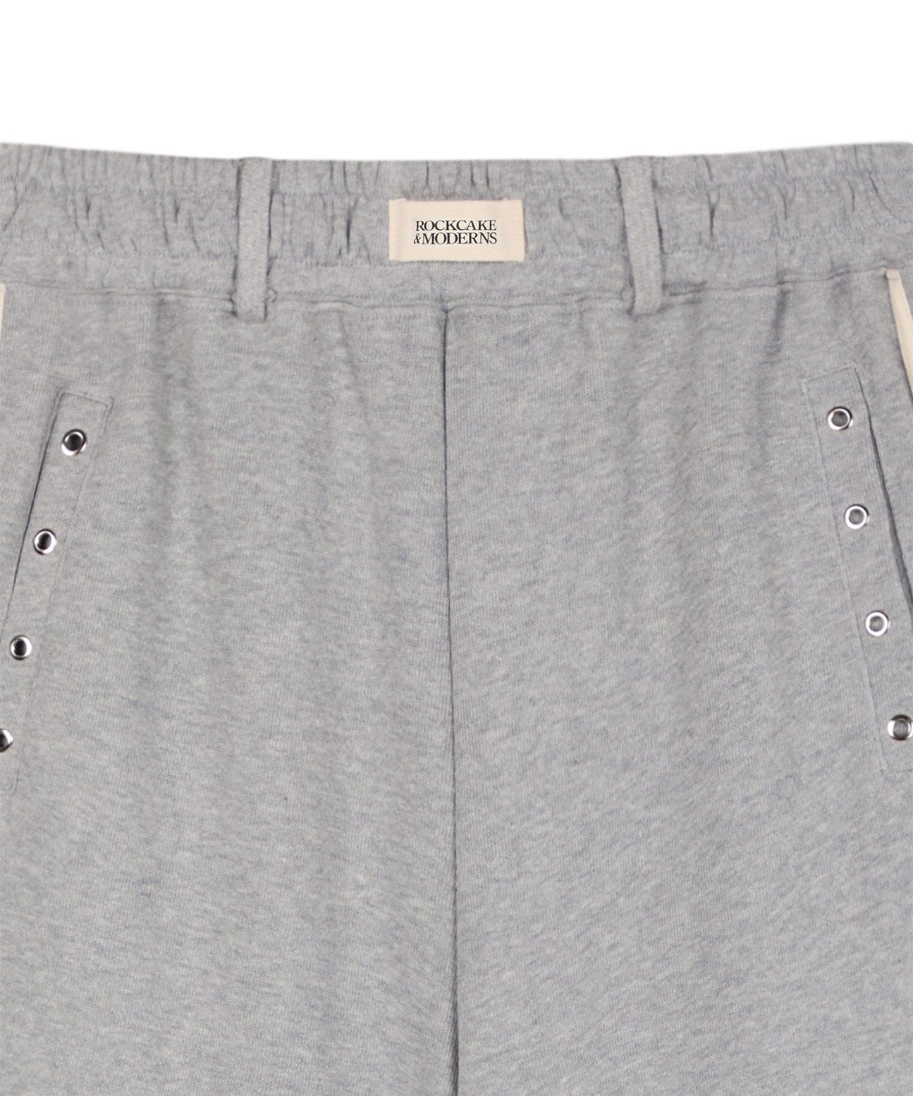 MUSINSA公式 | ROCKCAKE Beige Label Eyelet 2way Jogger Pants