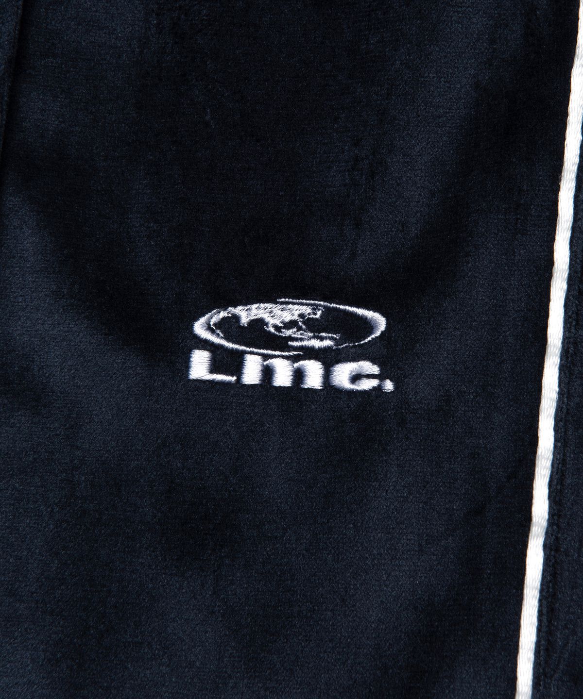 엘엠씨(LMC) VELOUR PIPING PANTS navy