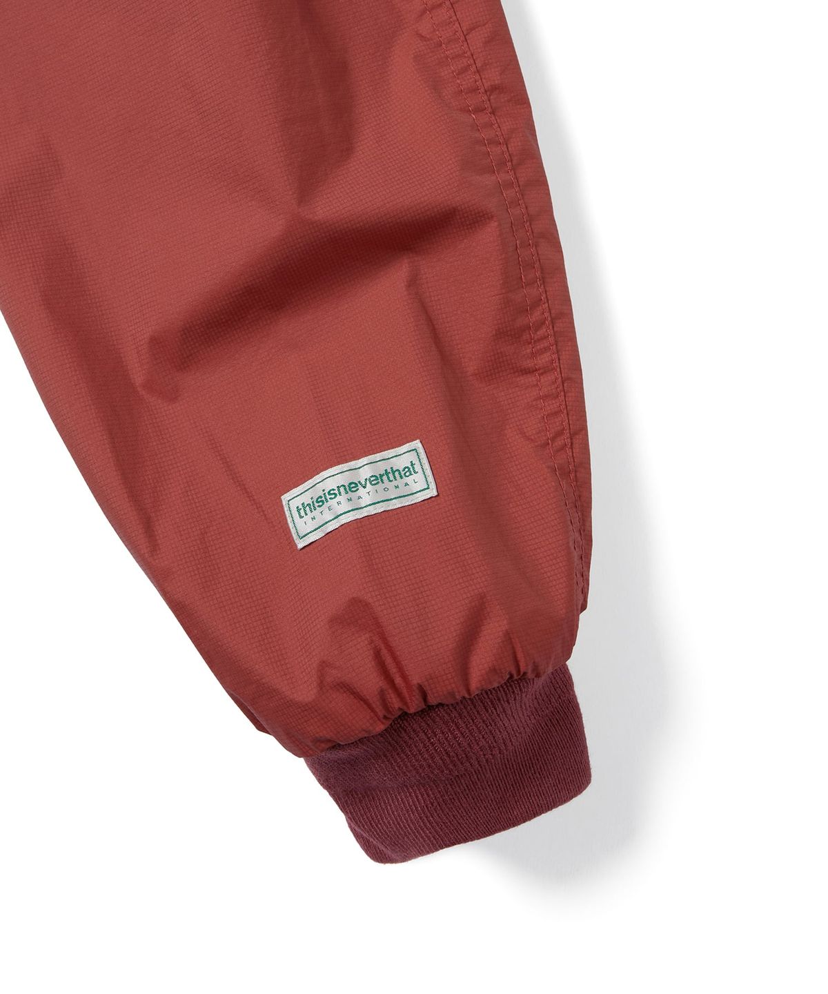 디스이즈네버댓(THISISNEVERTHAT) Reversible Warm Up Jacket Red