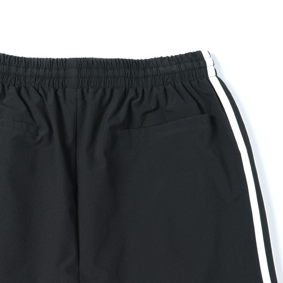 노드(NOD) Side line Wide Nylon pants (Black)