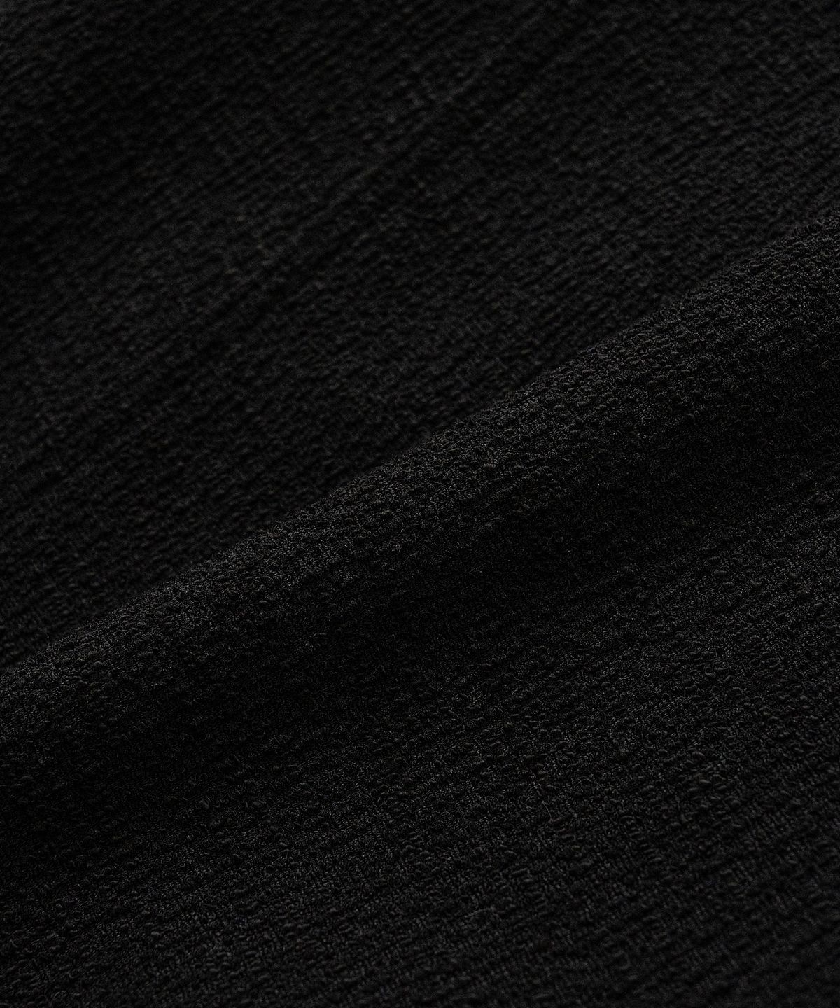 바스틱(VASTIC) 스텐실 니트 트러커_블랙