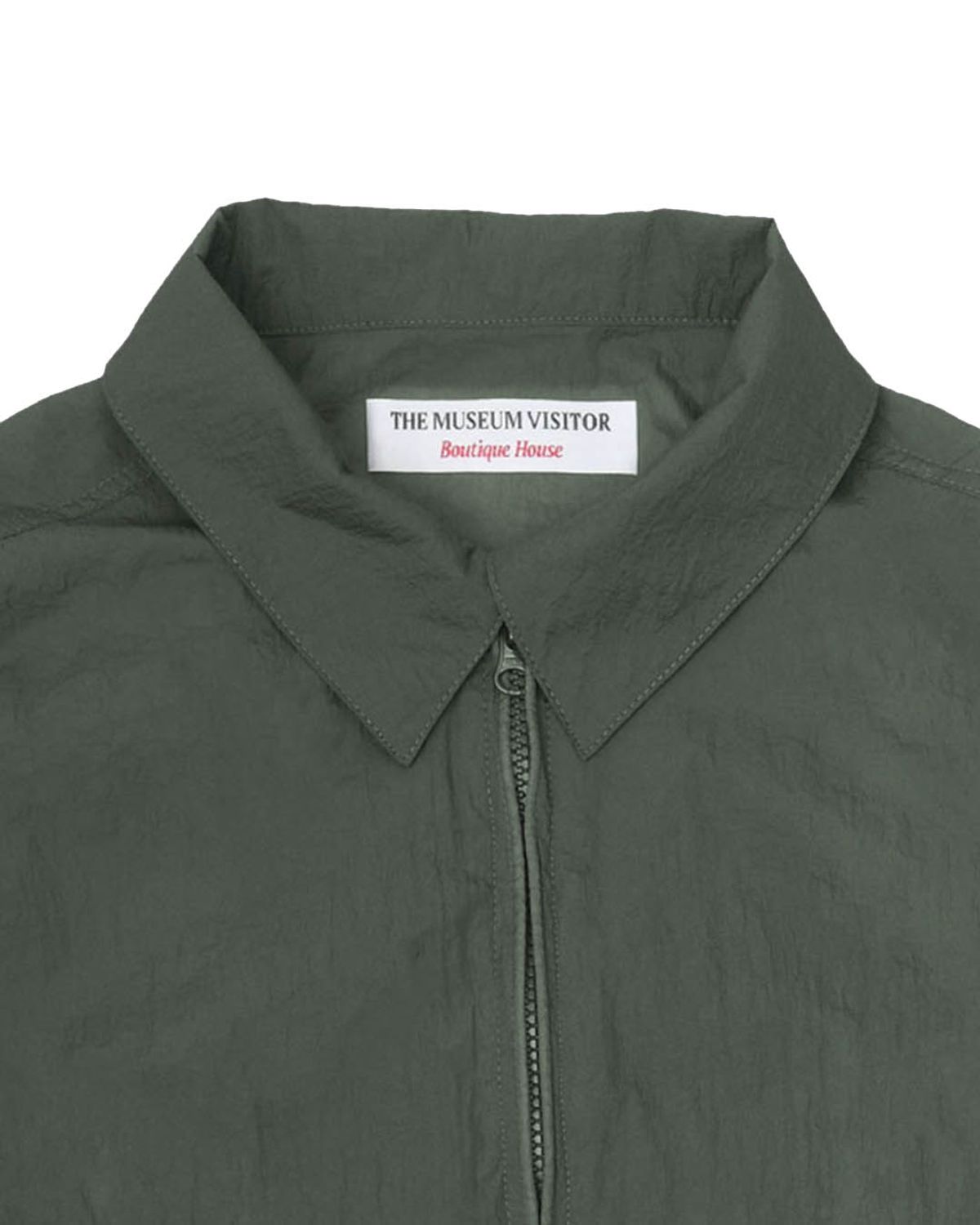 더뮤지엄비지터(THEMUSEUMVISITOR) HEART PRINTED WINDBREAKER (KHAKI)