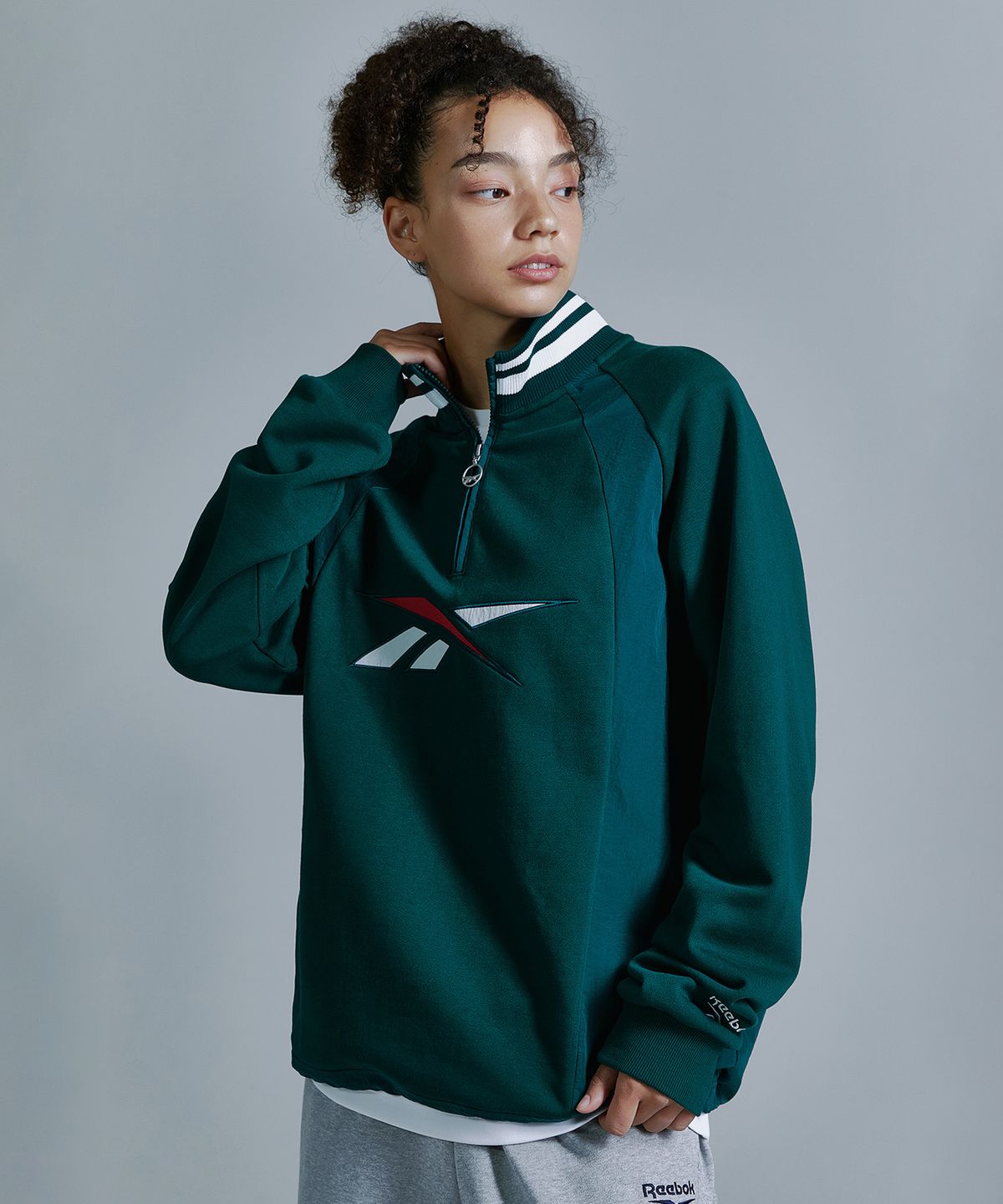 리복(REEBOK) 뉴벡터 하이브리드 하프 집업 - 그린