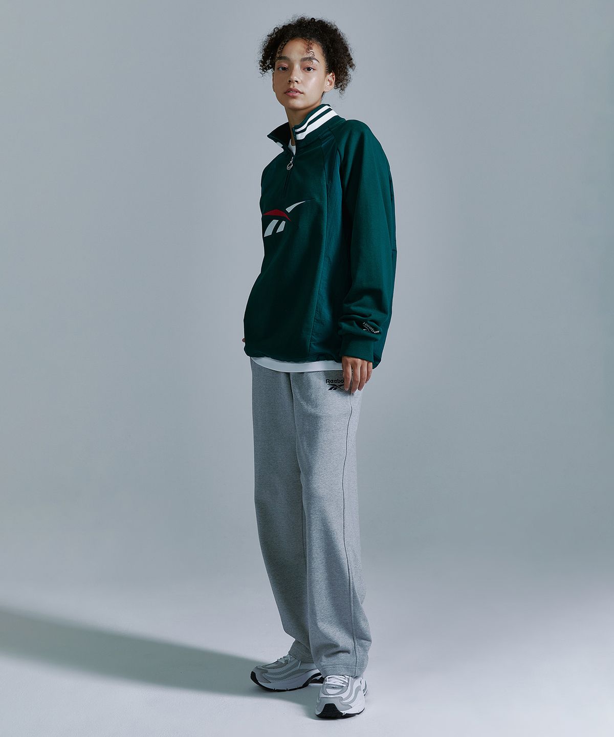리복(REEBOK) 뉴벡터 하이브리드 하프 집업 - 그린
