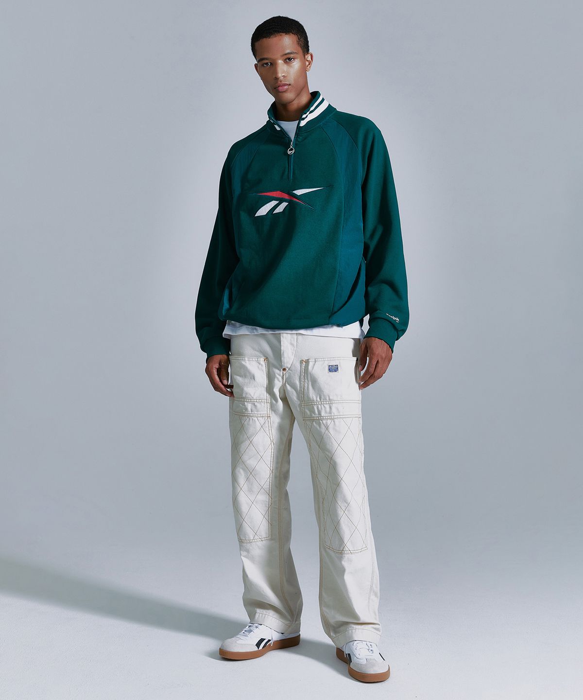 리복(REEBOK) 뉴벡터 하이브리드 하프 집업 - 그린