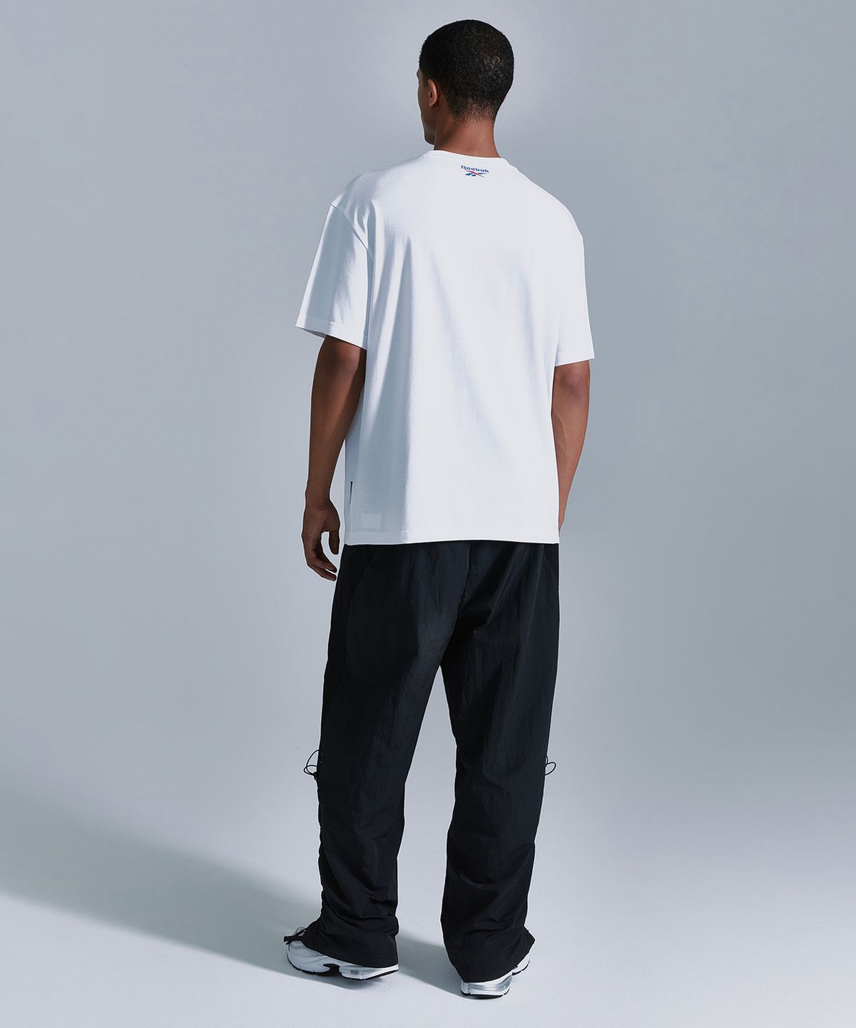 리복(REEBOK) 라이벌 립스탑 와이드 팬츠 - 블랙