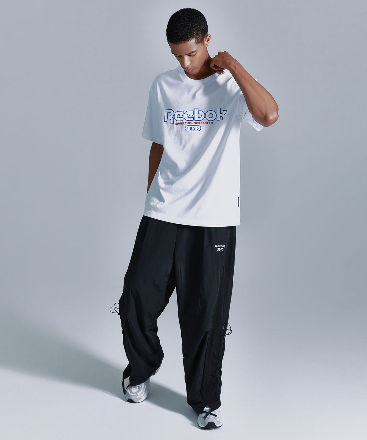 리복(REEBOK) 라이벌 립스탑 와이드 팬츠 - 블랙