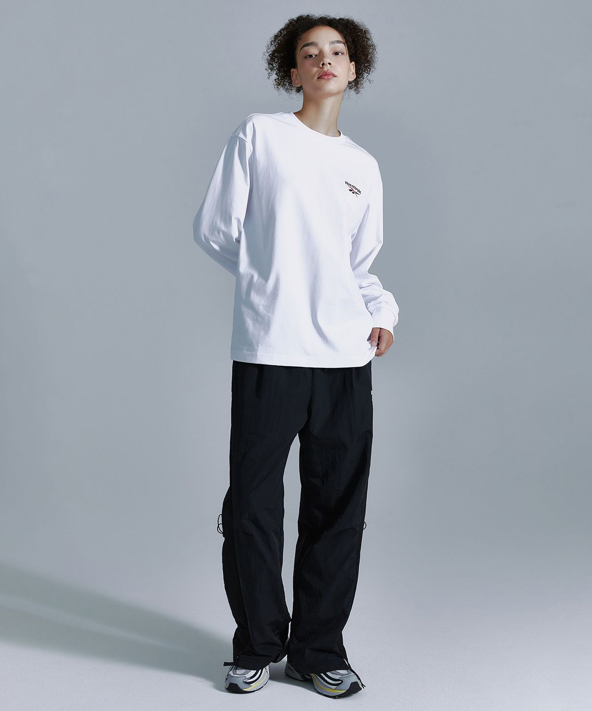 리복(REEBOK) 라이벌 립스탑 와이드 팬츠 - 블랙
