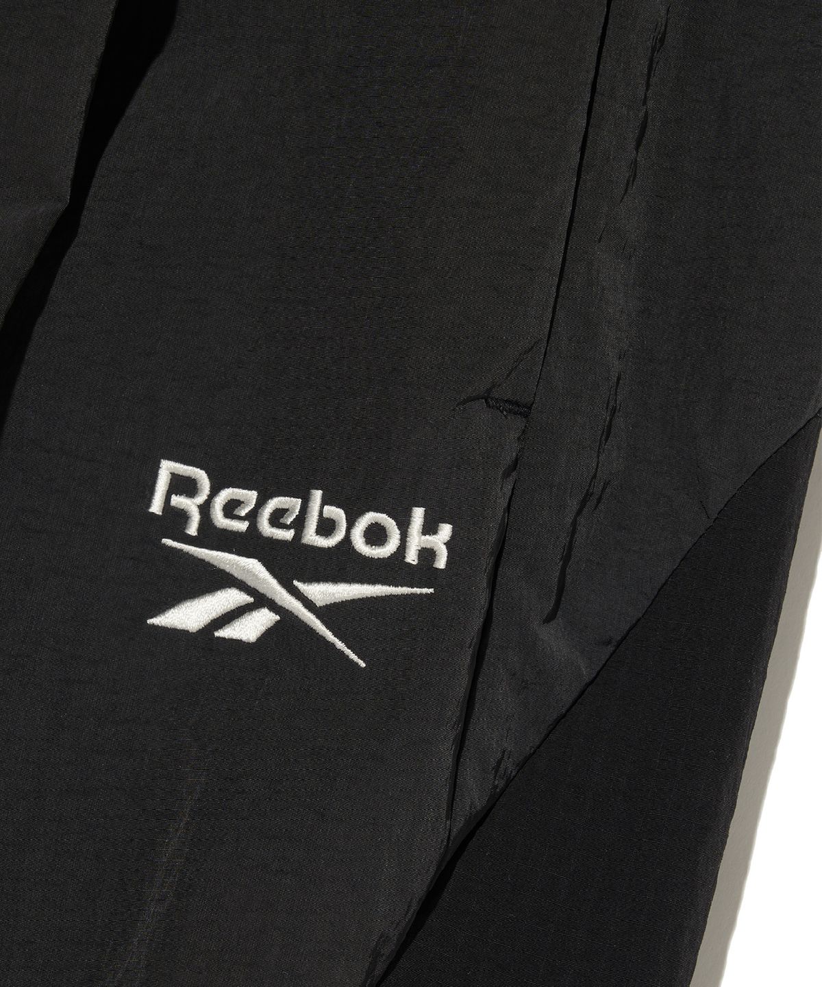 리복(REEBOK) 라이벌 립스탑 와이드 팬츠 - 블랙