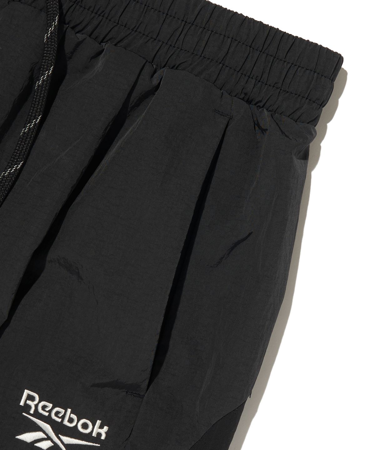 리복(REEBOK) 라이벌 립스탑 와이드 팬츠 - 블랙