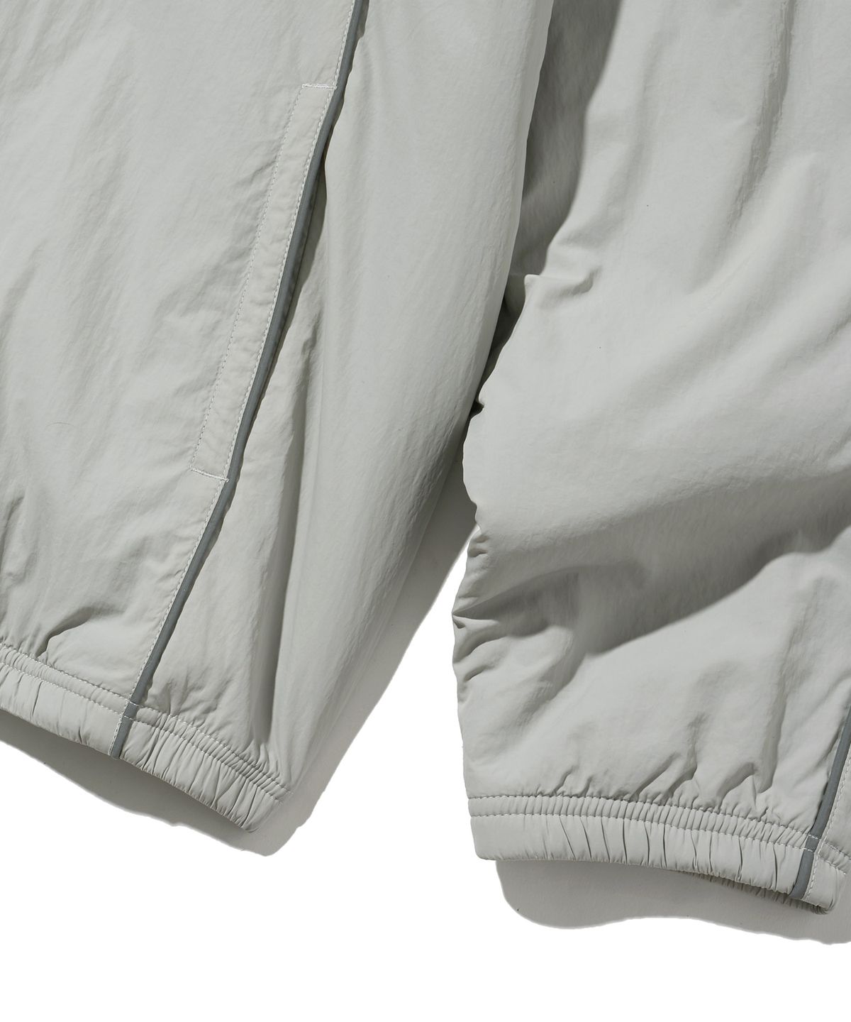 브라운브레스(BROWNBREATH) TAG NYLON TRACK JACKET - LIGHT GREY