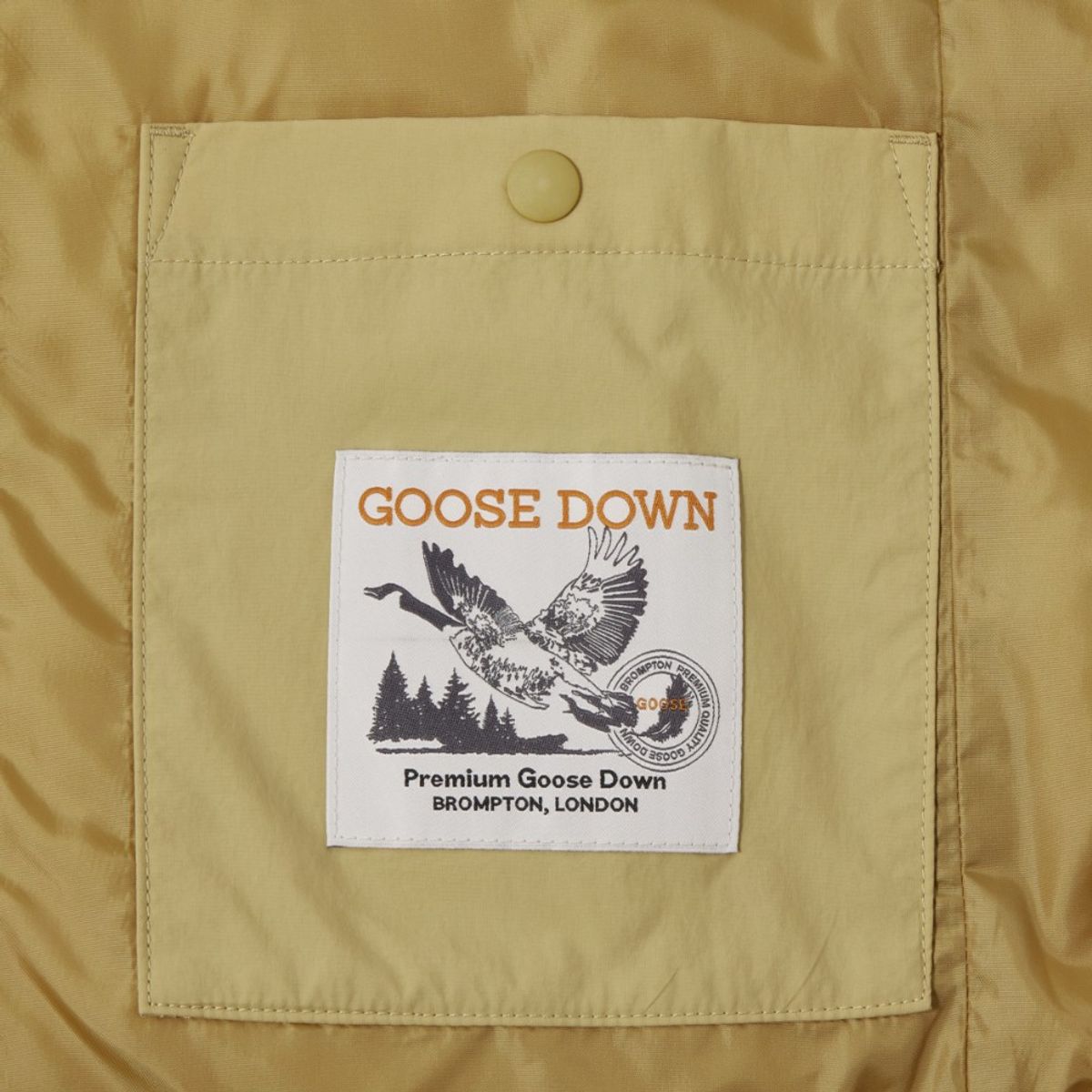 브롬톤 런던(BROMPTON LONDON) AEROWARM LIGHTWEIGHT DOWNJUMPER - MUSTARD (P244UDW101)