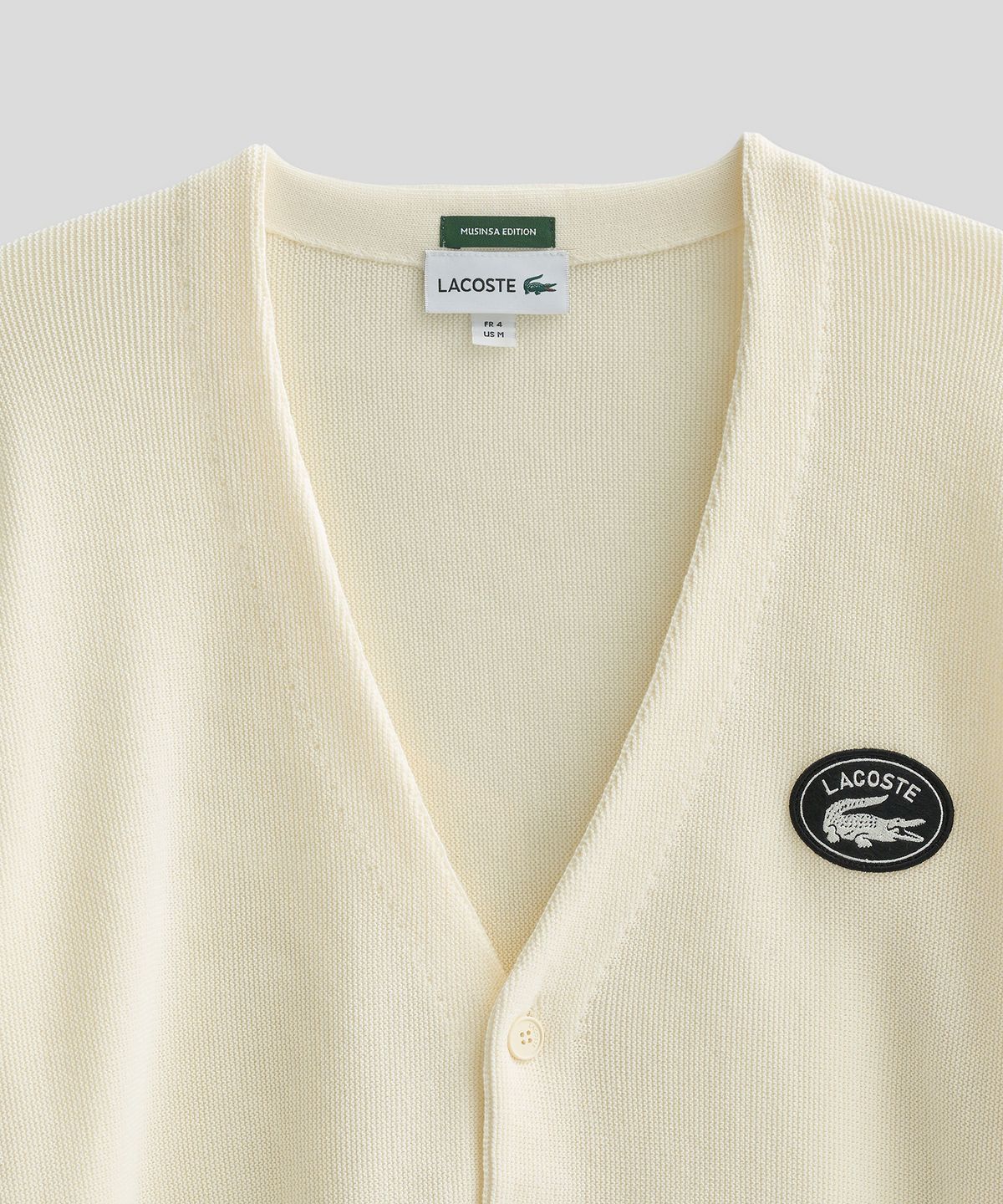 라코스테(LACOSTE) 링스링스 가디건 (아이보리)