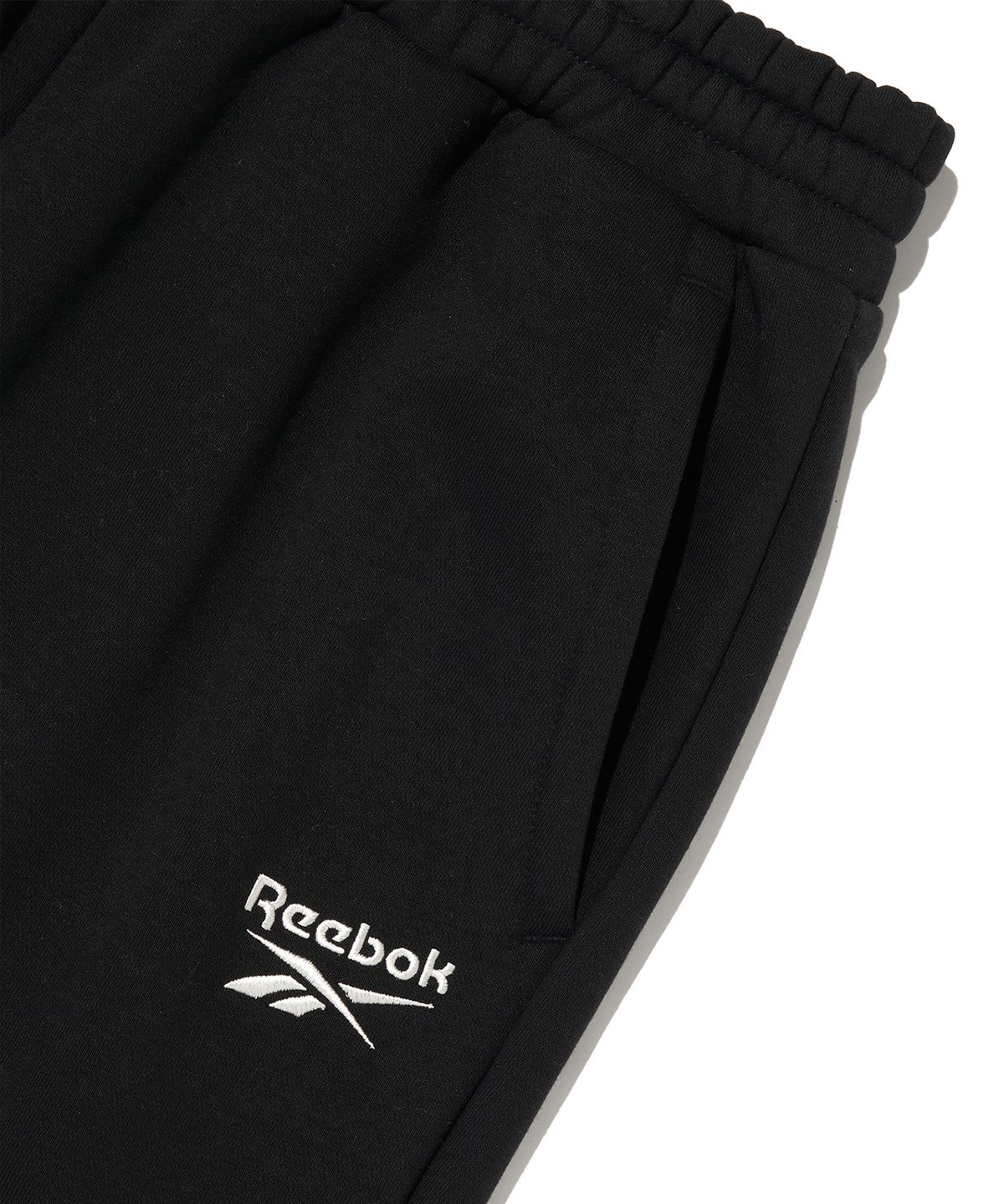 리복(REEBOK) 2WAY 기모 스웨트 팬츠 - 블랙