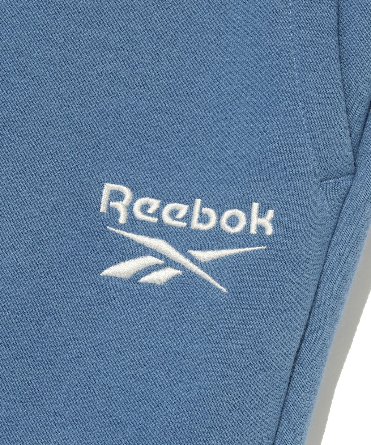 리복(REEBOK) 2WAY 기모 스웨트 팬츠 - 블루