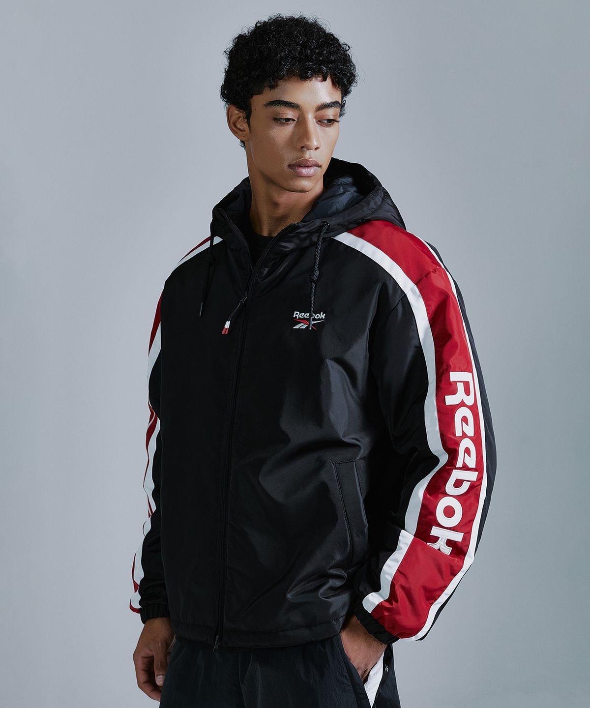 리복(REEBOK) 벡터 패널드 패딩 자켓 - 블랙
