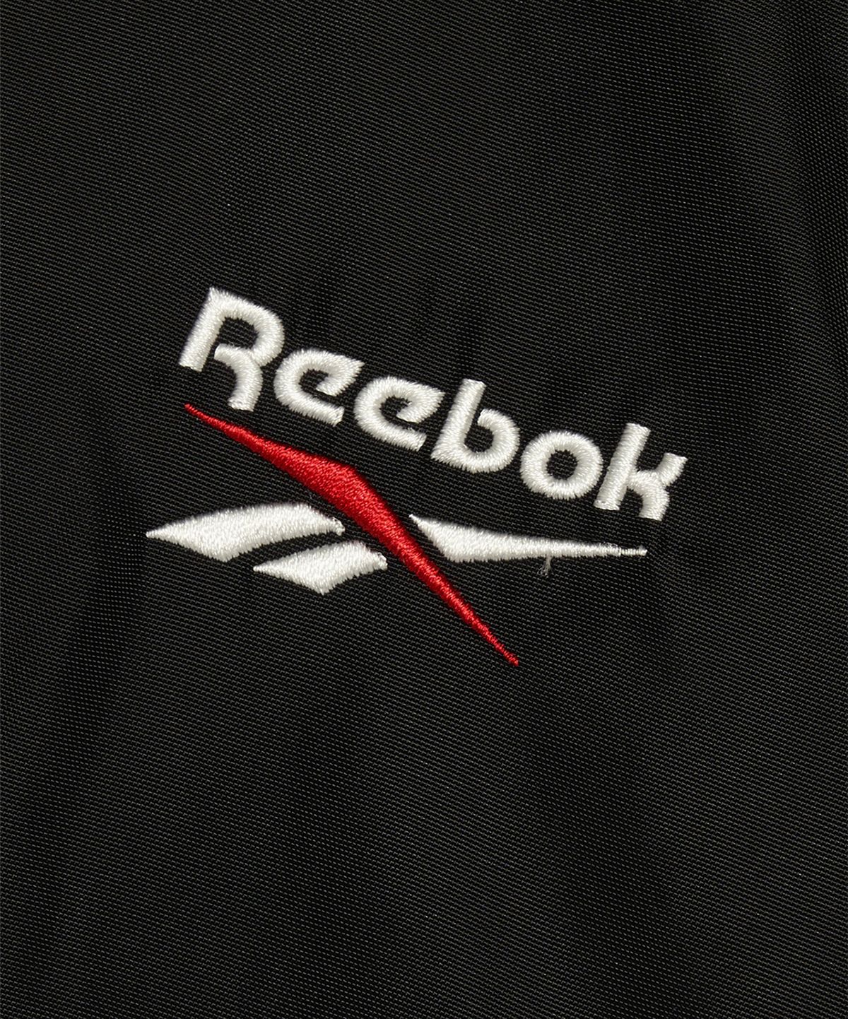 리복(REEBOK) 벡터 패널드 패딩 자켓 - 블랙