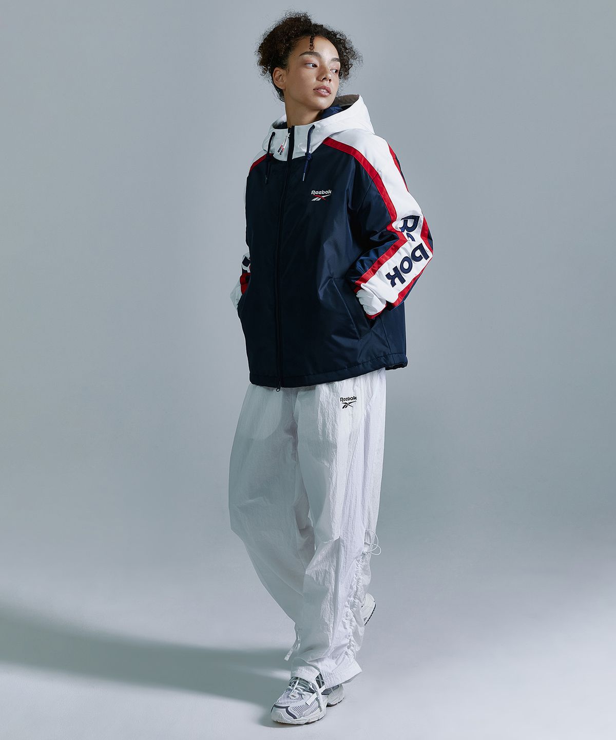 리복(REEBOK) 벡터 패널드 패딩 자켓 - 네이비