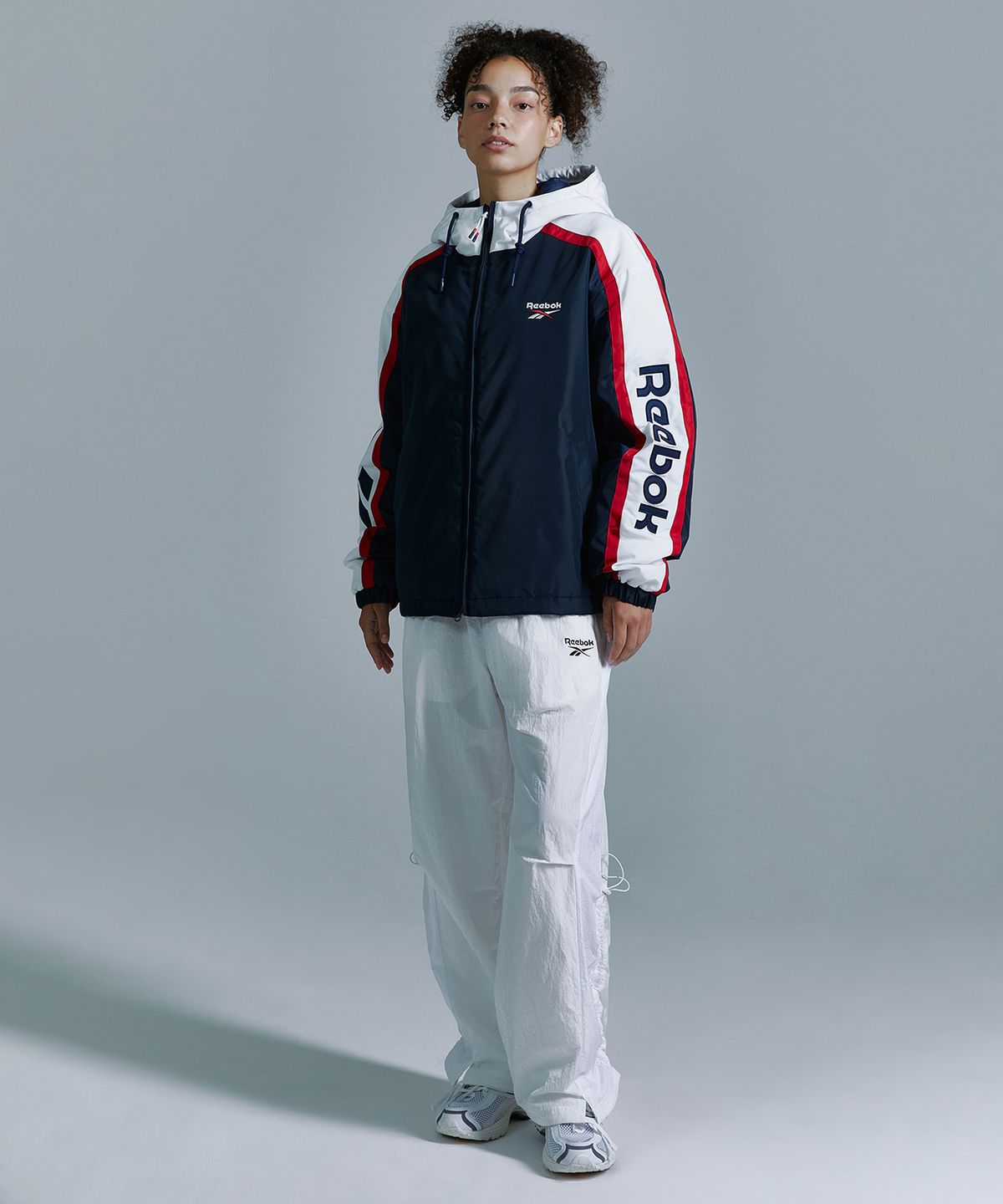 리복(REEBOK) 벡터 패널드 패딩 자켓 - 네이비