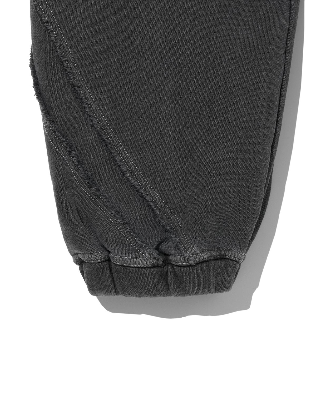 로어즈(LORES) Curved Line Dyed Sweatpants - Charcoal