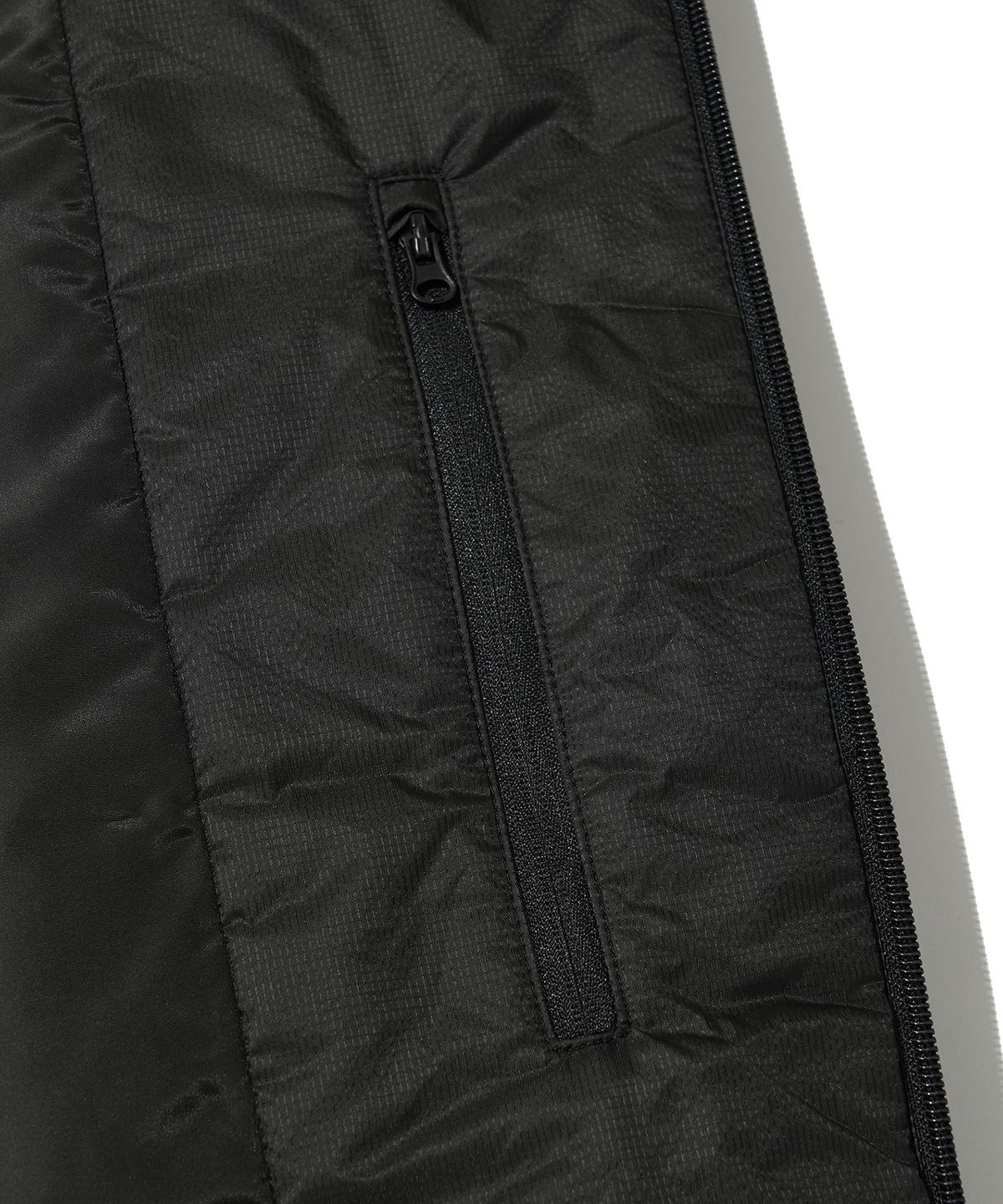 웰터 익스페리먼트(WELTER EXPERIMENT) TORRES PRIMALOFT VEST_BLACK_WOL082