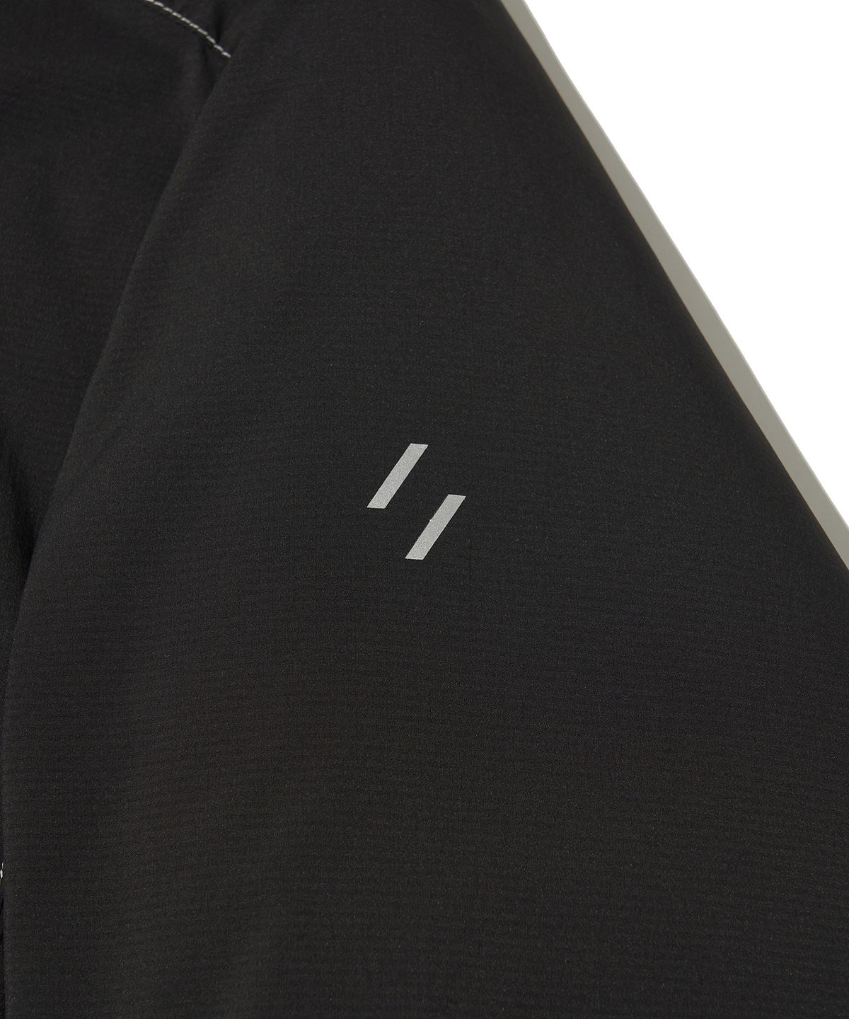 웰터 익스페리먼트(WELTER EXPERIMENT) REFLECTIVE STITCH PRIMALOFT INSULATION JACKET_BLACK_WOL085