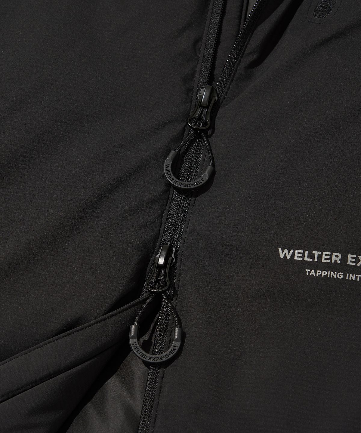 웰터 익스페리먼트(WELTER EXPERIMENT) REFLECTIVE STITCH PRIMALOFT INSULATION JACKET_BLACK_WOL085