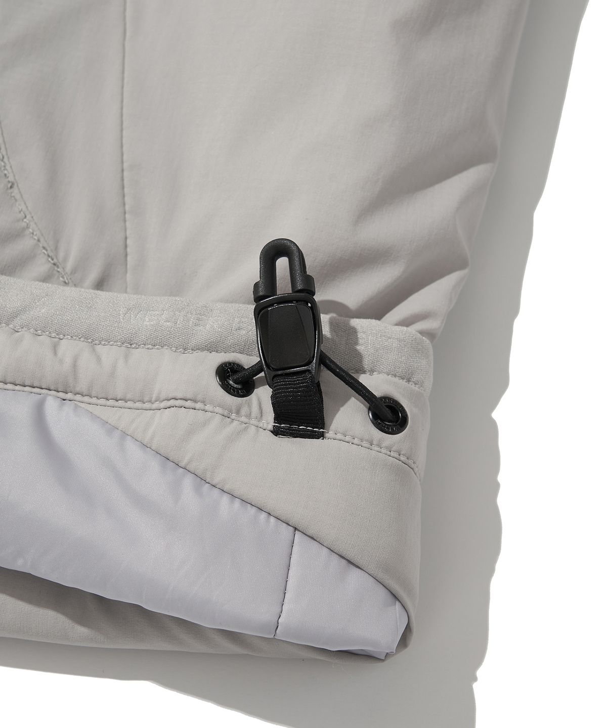 웰터 익스페리먼트(WELTER EXPERIMENT) REFLECTIVE STITCH PRIMALOFT INSULATION JACKET_LIGHT GRAY_WOL086