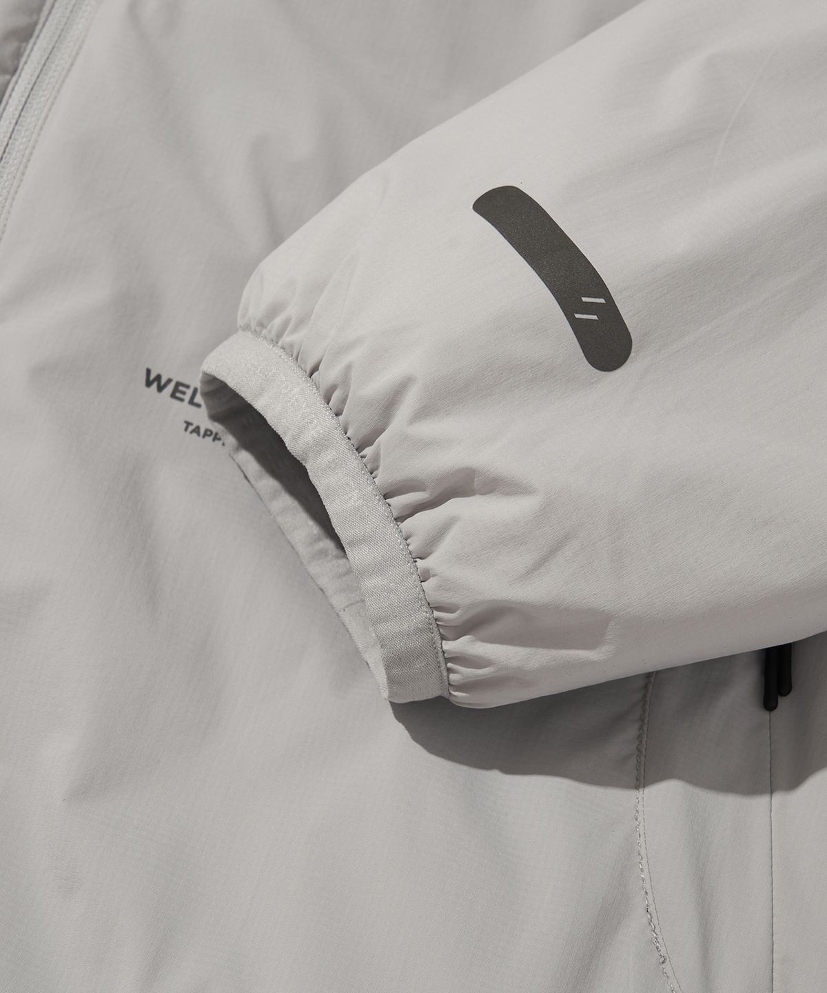 웰터 익스페리먼트(WELTER EXPERIMENT) REFLECTIVE STITCH PRIMALOFT INSULATION JACKET_LIGHT GRAY_WOL086