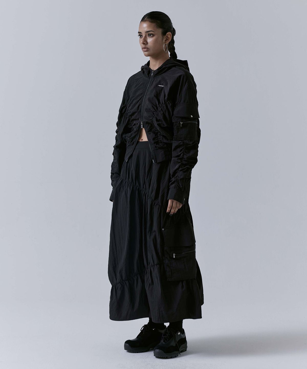 트리밍버드(TREEMINGBIRD) Nylon Cargo Shirring Set-up Zip-up [ Black ]