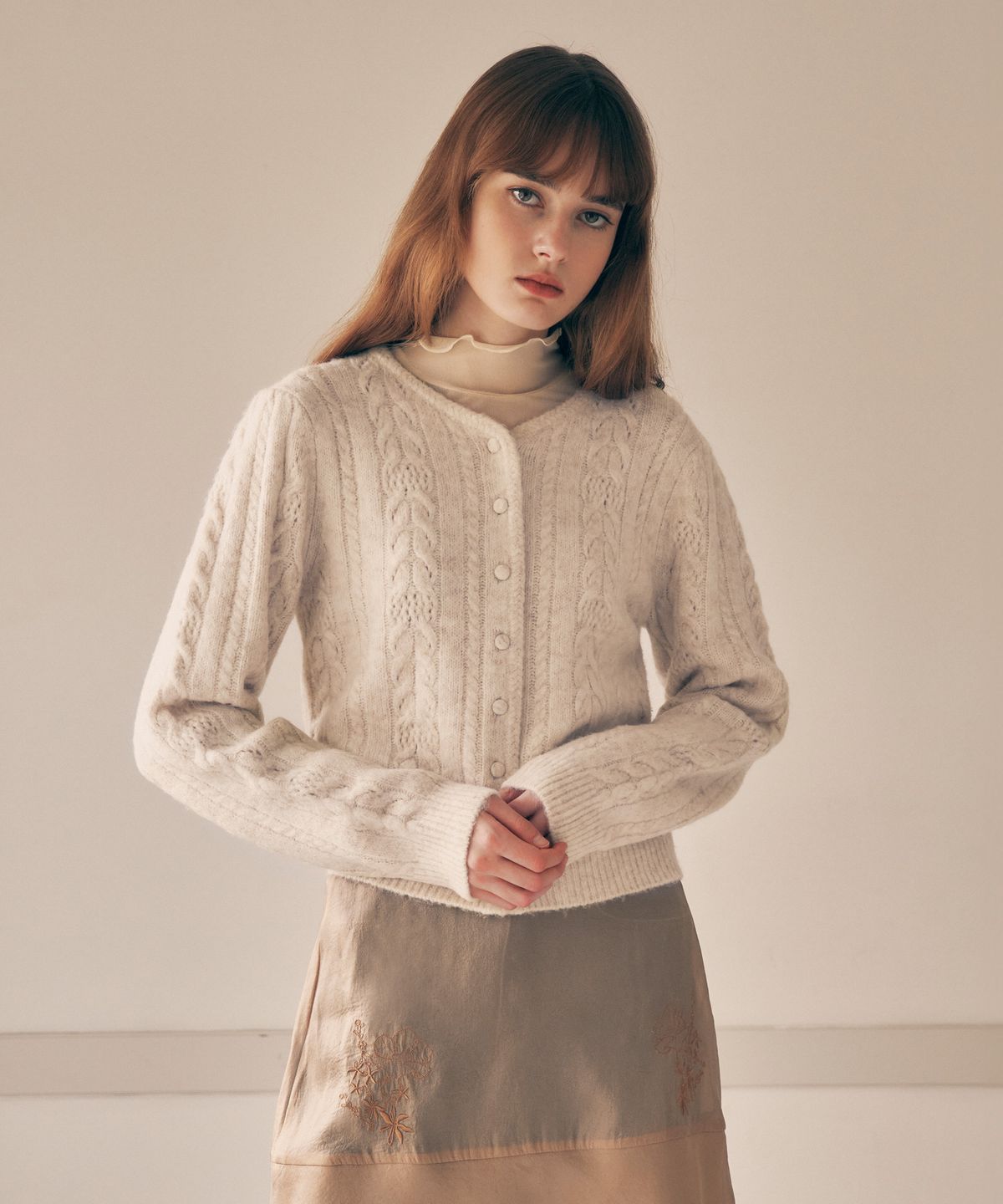 로라로라(ROLAROLA) PUFF SLEEVE CABLE CARDIGAN IVORY