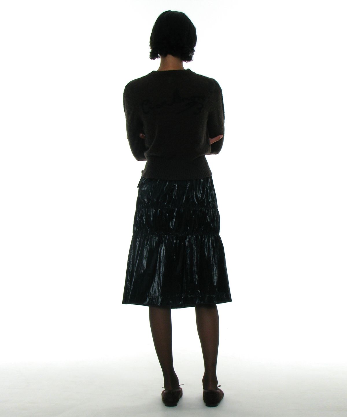 파르티멘토 우먼(PARTIMENTO WOMEN) 스모킹 랩 미디 스커트_블랙