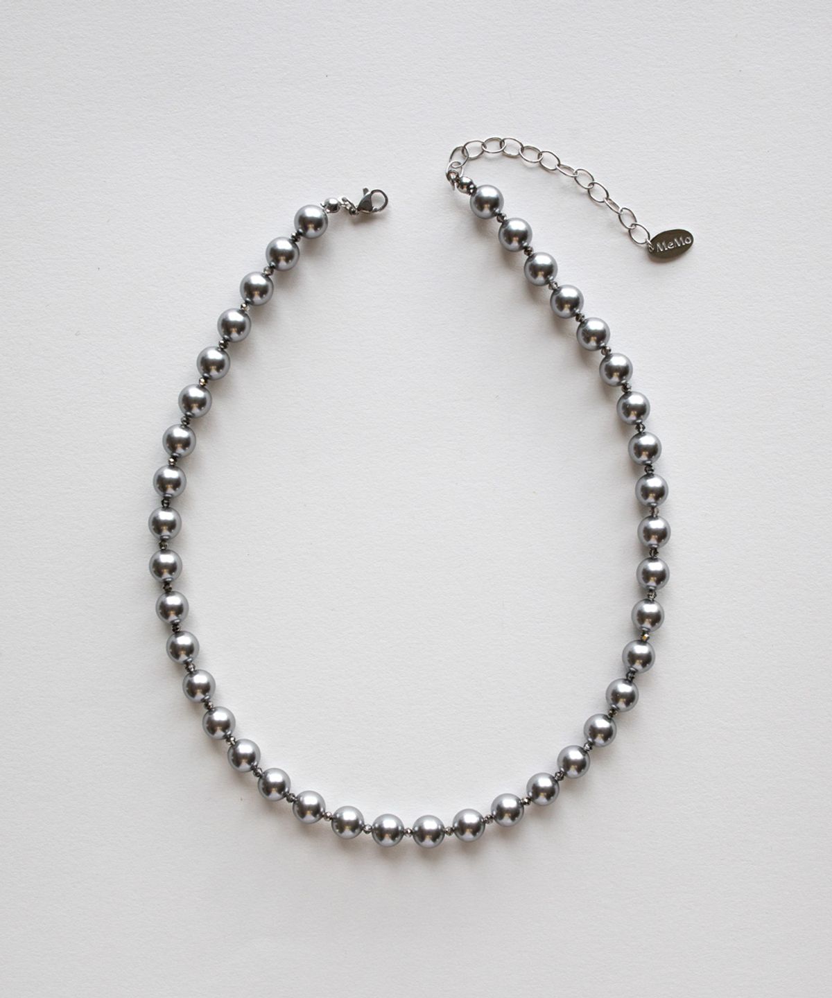 메리모티브(MERRYMOTIVE) Silver pearl and crystal necklace