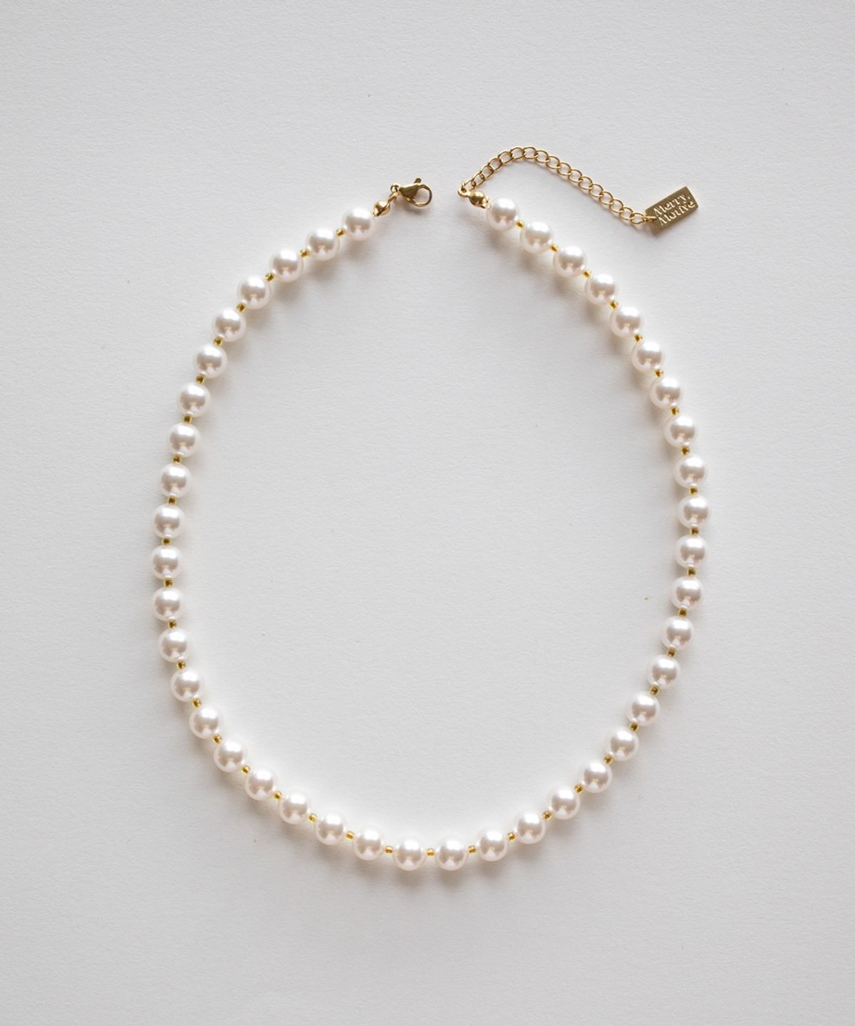 메리모티브(MERRYMOTIVE) Voluminous white pearl necklace