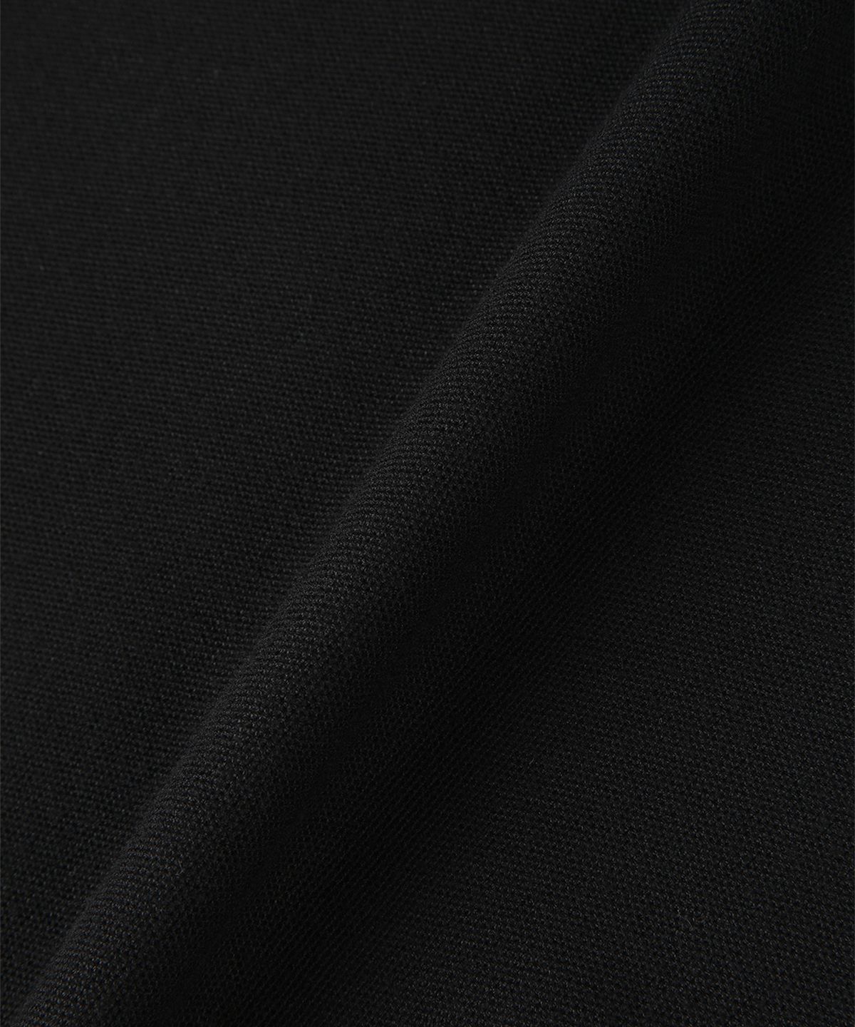 빠니깔레(PANICALE) 블랙 반집업 카라 니트