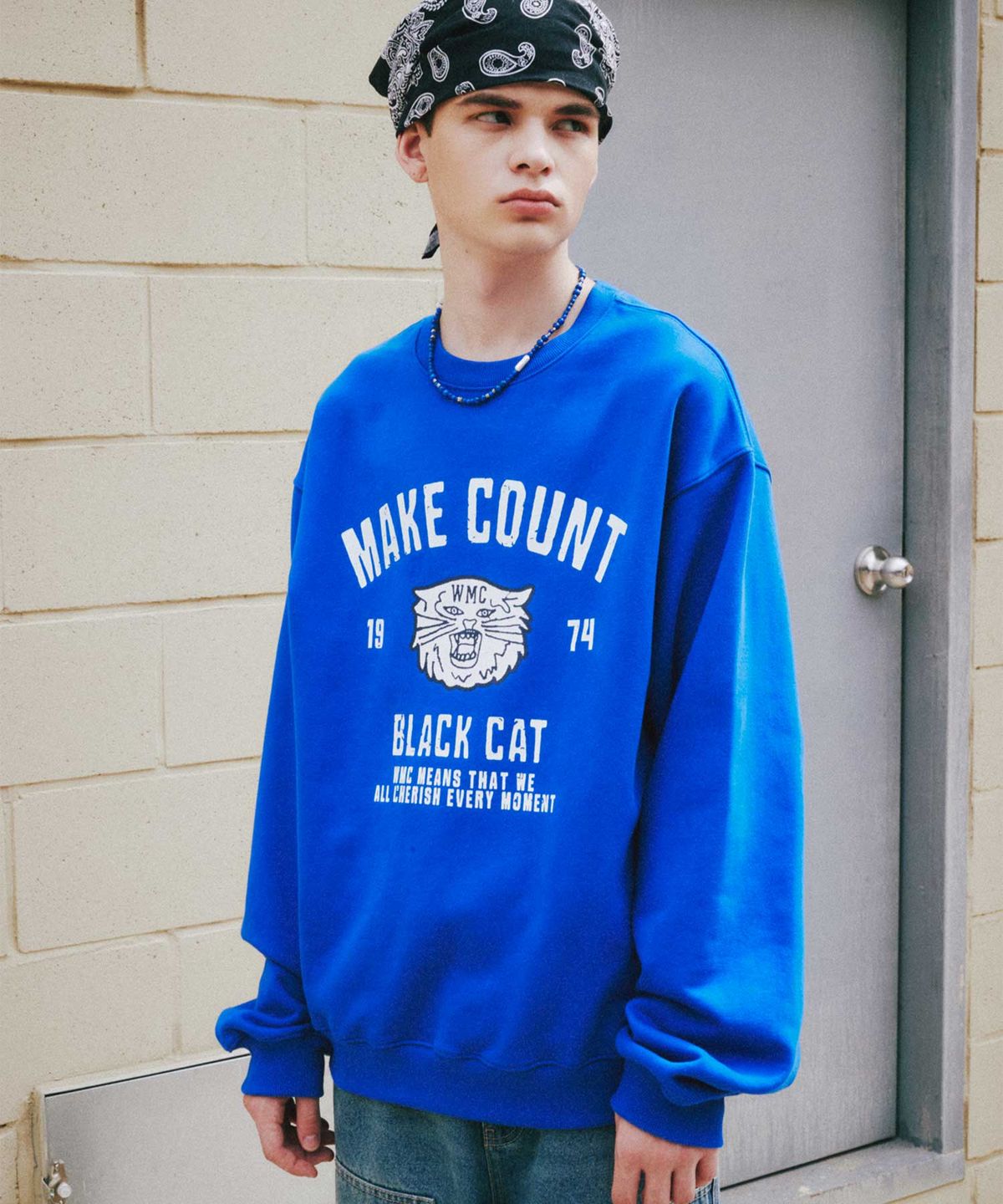 더블유엠씨(WMC) 블랙캣 맨투맨_BLUE