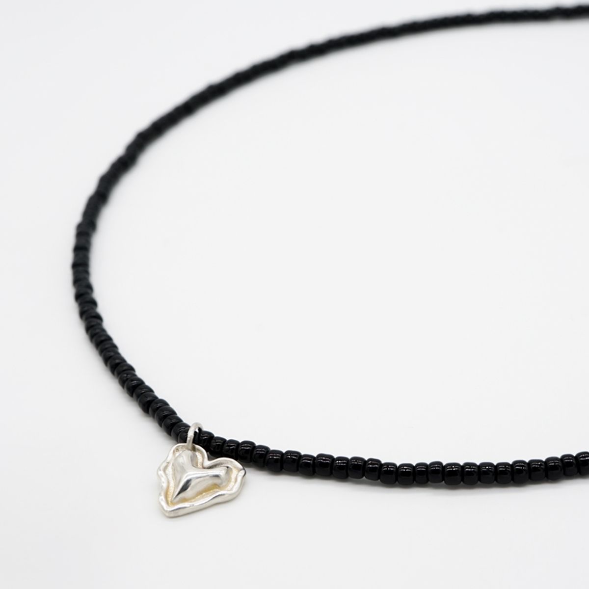 하카블랙스(HAKKABLACKS) Wave Heart Necklace