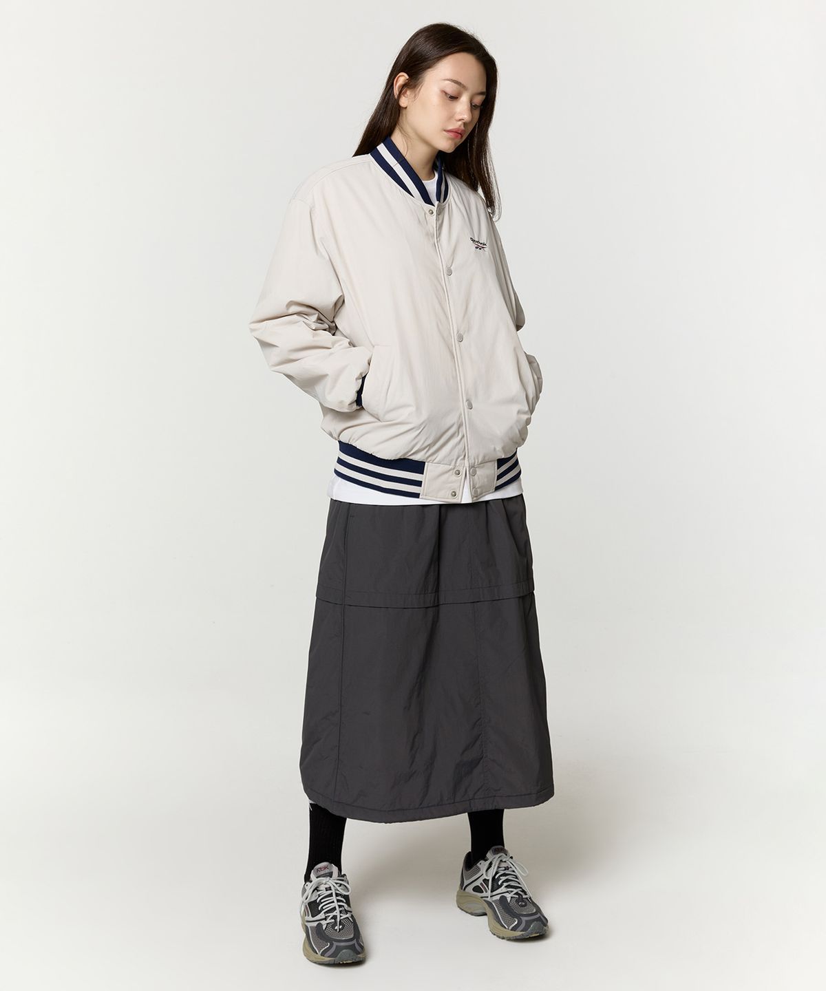 리복(REEBOK) 뉴베이직 바시티 자켓 - 베이지