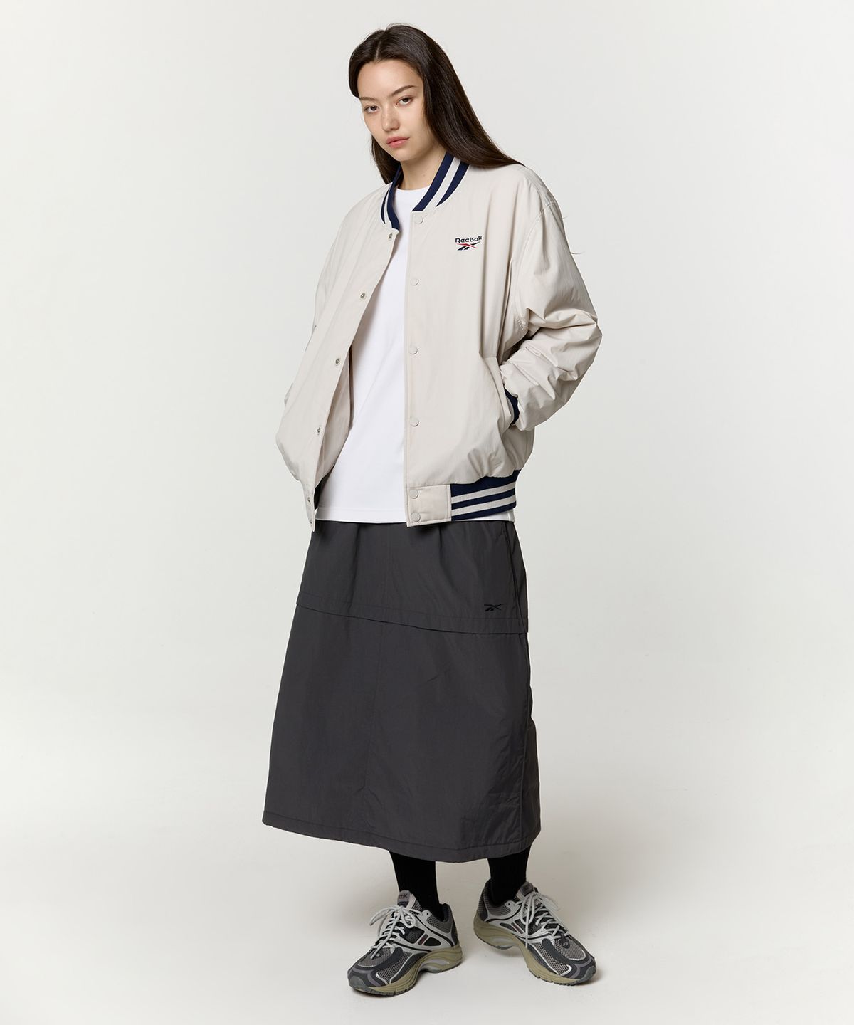 리복(REEBOK) 뉴베이직 바시티 자켓 - 베이지