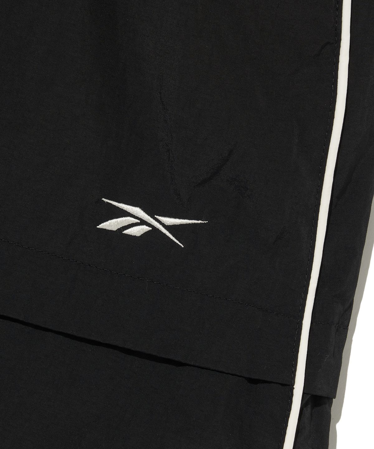 리복(REEBOK) 파라슈트 패딩 스커트 (W) - 블랙