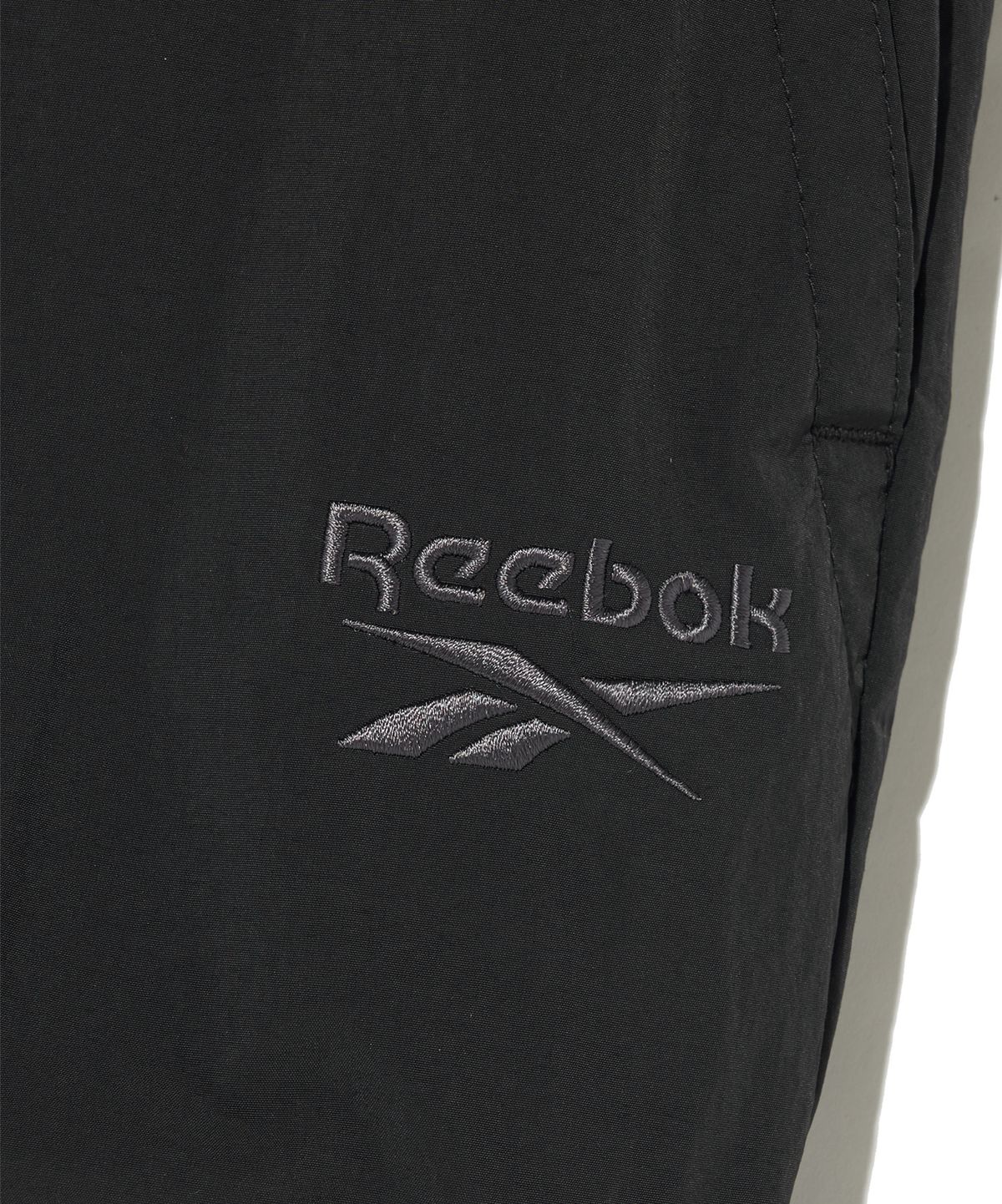 리복(REEBOK) 우븐 웜 카고 팬츠 - 블랙
