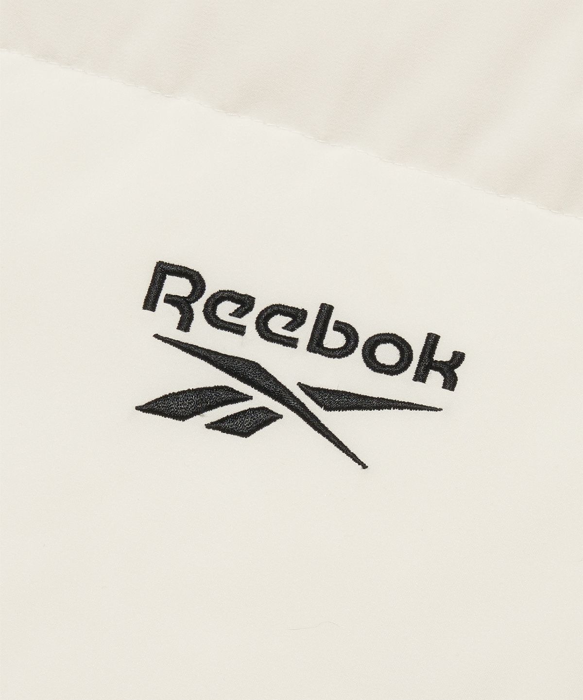 리복(REEBOK) 액티브 숏 다운 자켓 - 아이보리