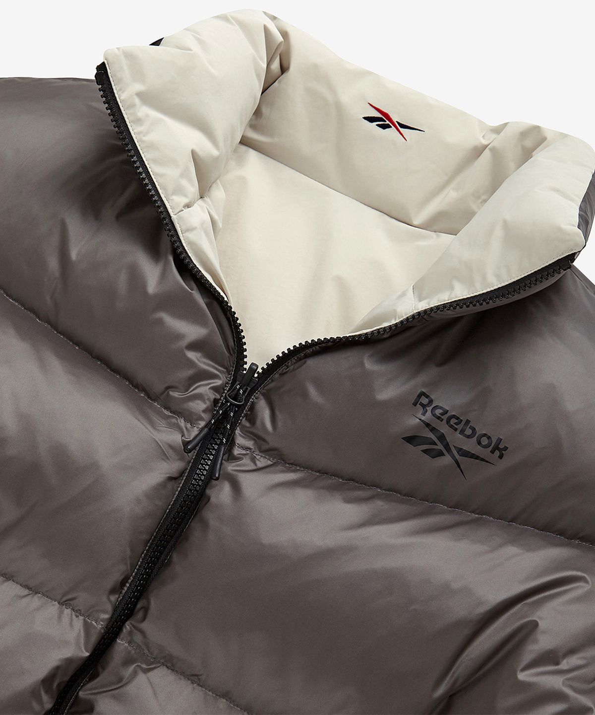 리복(REEBOK) 벡터 리버시블 다운 자켓 - 베이지