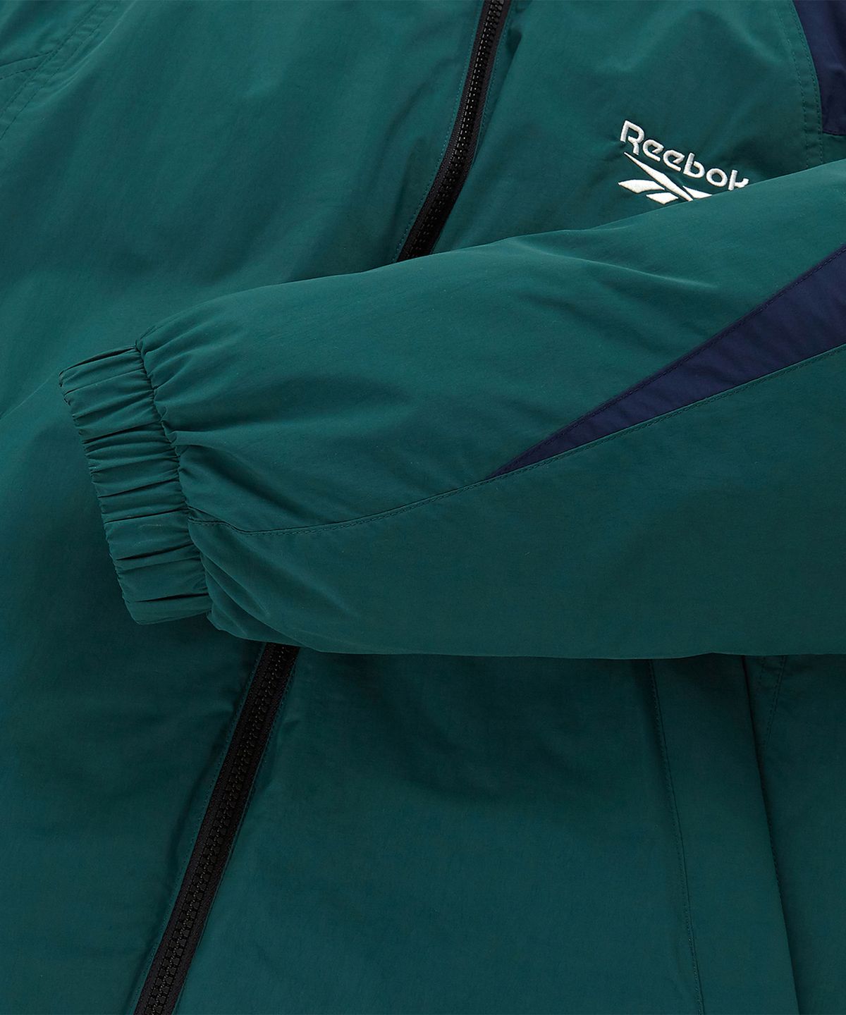 리복(REEBOK) 벡터 리버시블 다운 자켓 - 그린