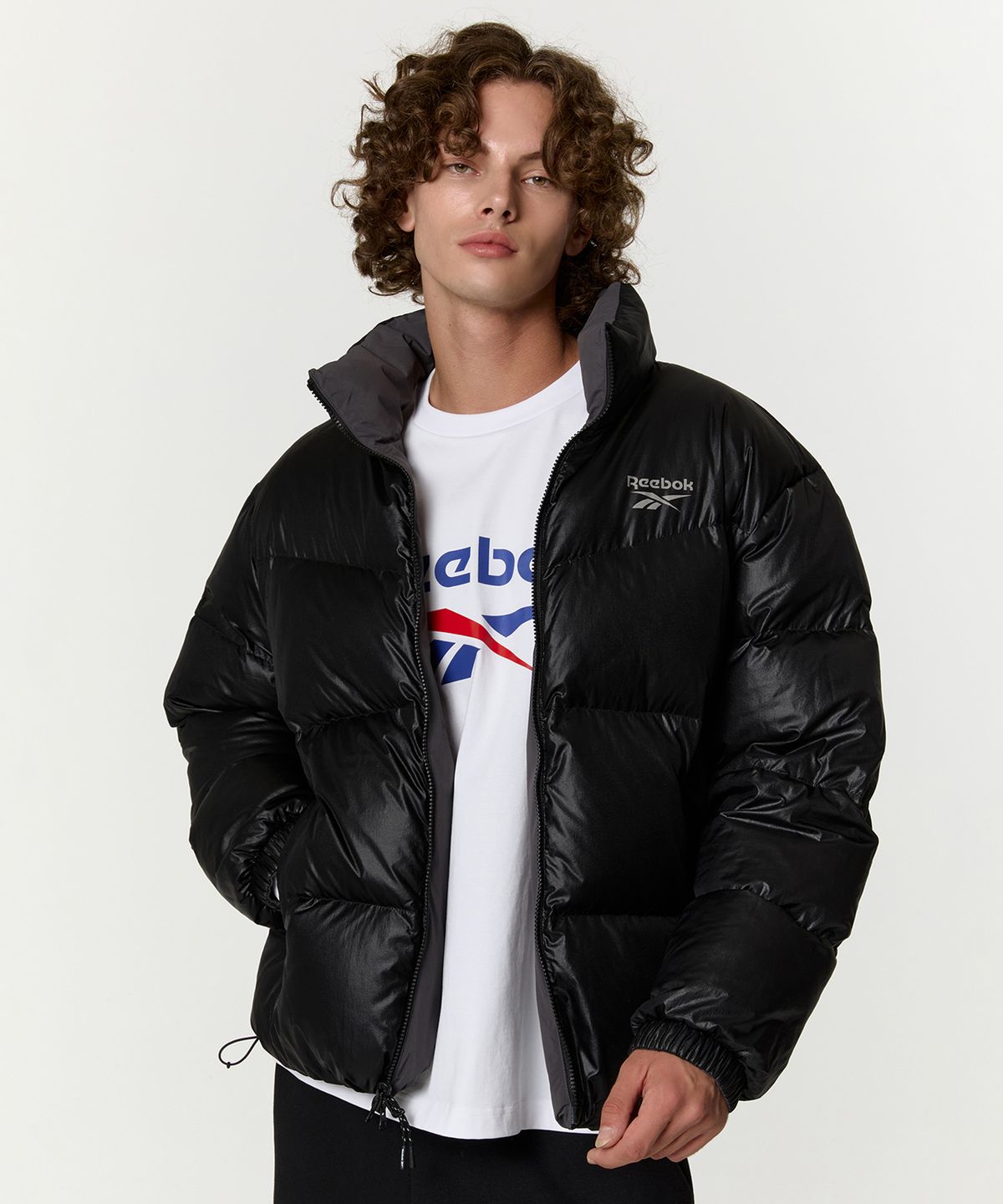 리복(REEBOK) 벡터 리버시블 다운 자켓 - 차콜