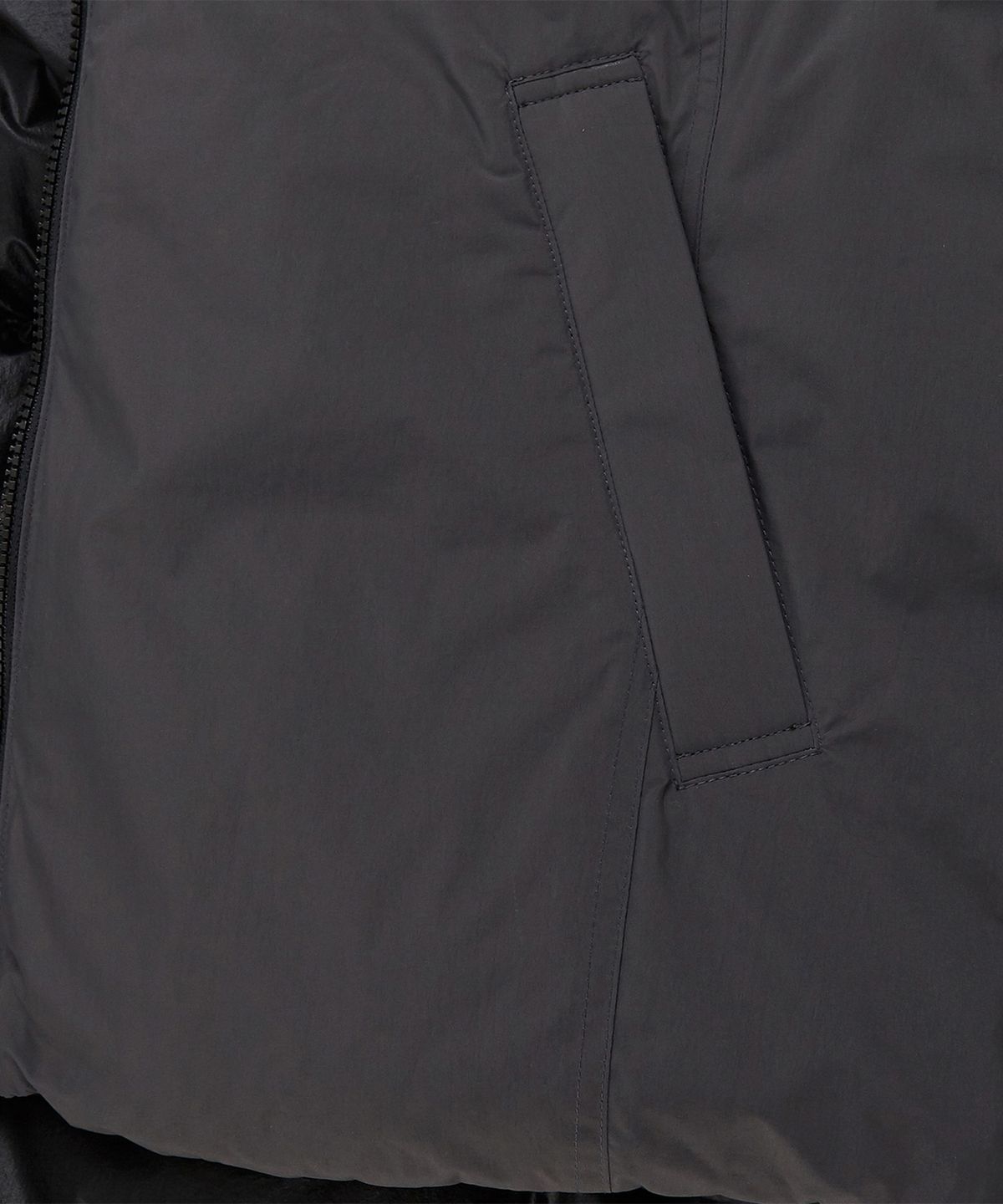 리복(REEBOK) 벡터 리버시블 다운 자켓 - 차콜