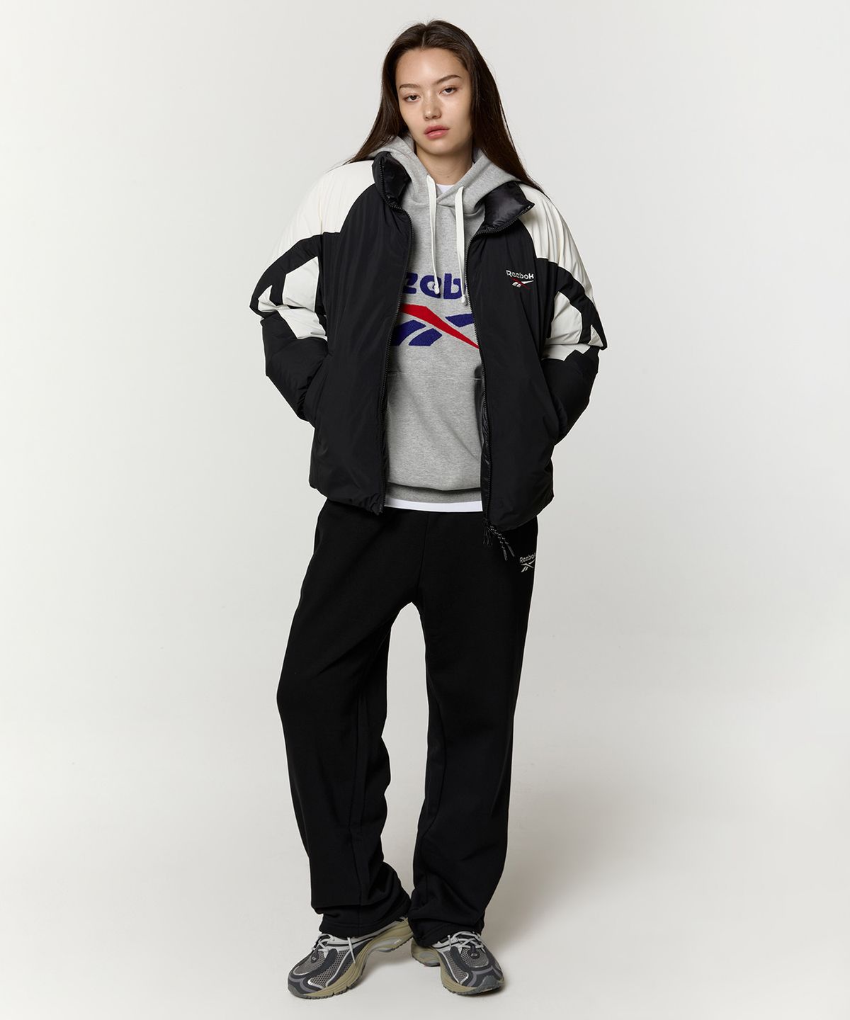 리복(REEBOK) 벡터 리버시블 다운 자켓 - 블랙