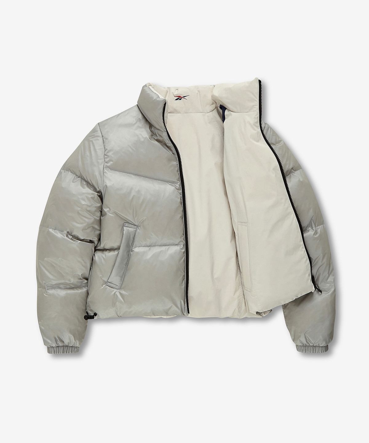 리복(REEBOK) 벡터 리버시블 크롭 다운 자켓 (W) - 베이지