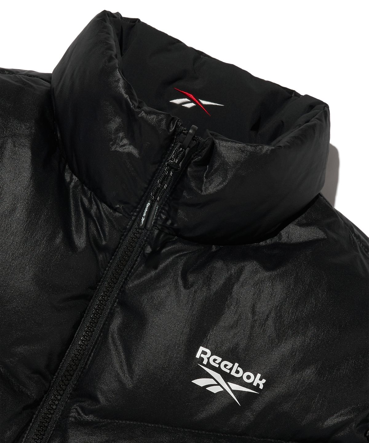 리복(REEBOK) 벡터 리버시블 크롭 다운 자켓 (W) - 블랙