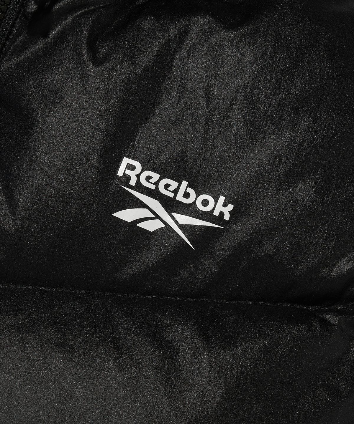 리복(REEBOK) 벡터 리버시블 크롭 다운 자켓 (W) - 블랙